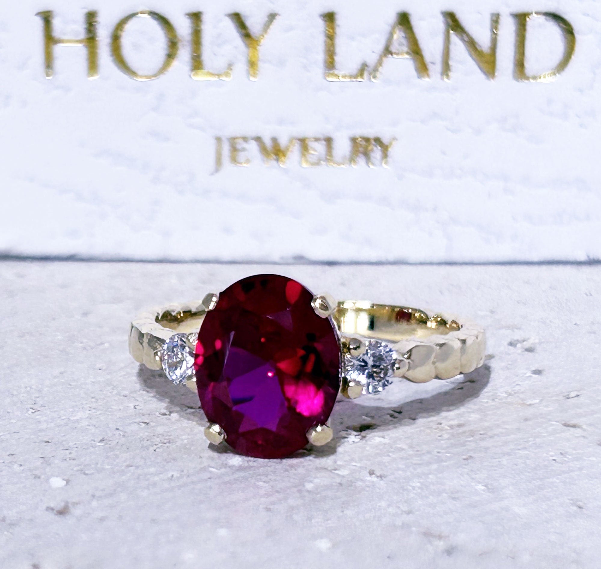 Oval Ruby Ring with Clear Quartz Accents - H.L.Jewelry