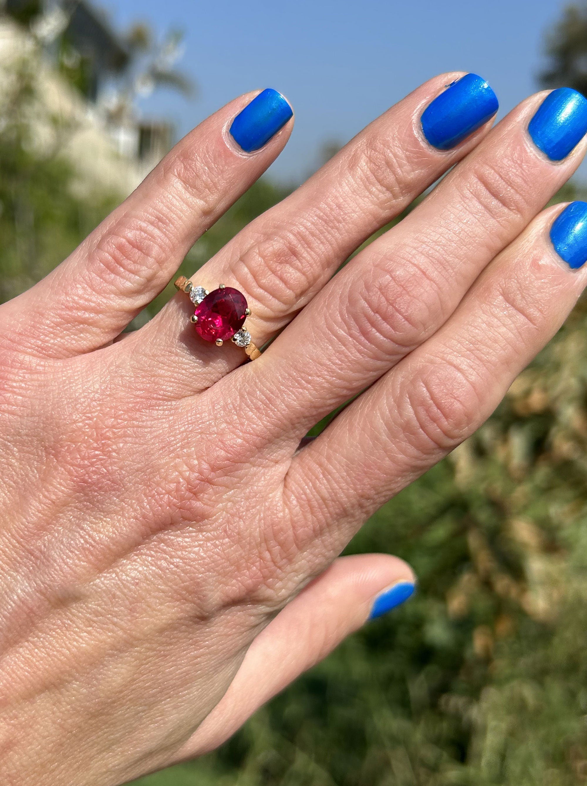 Oval Ruby Ring with Clear Quartz Accents - H.L.Jewelry