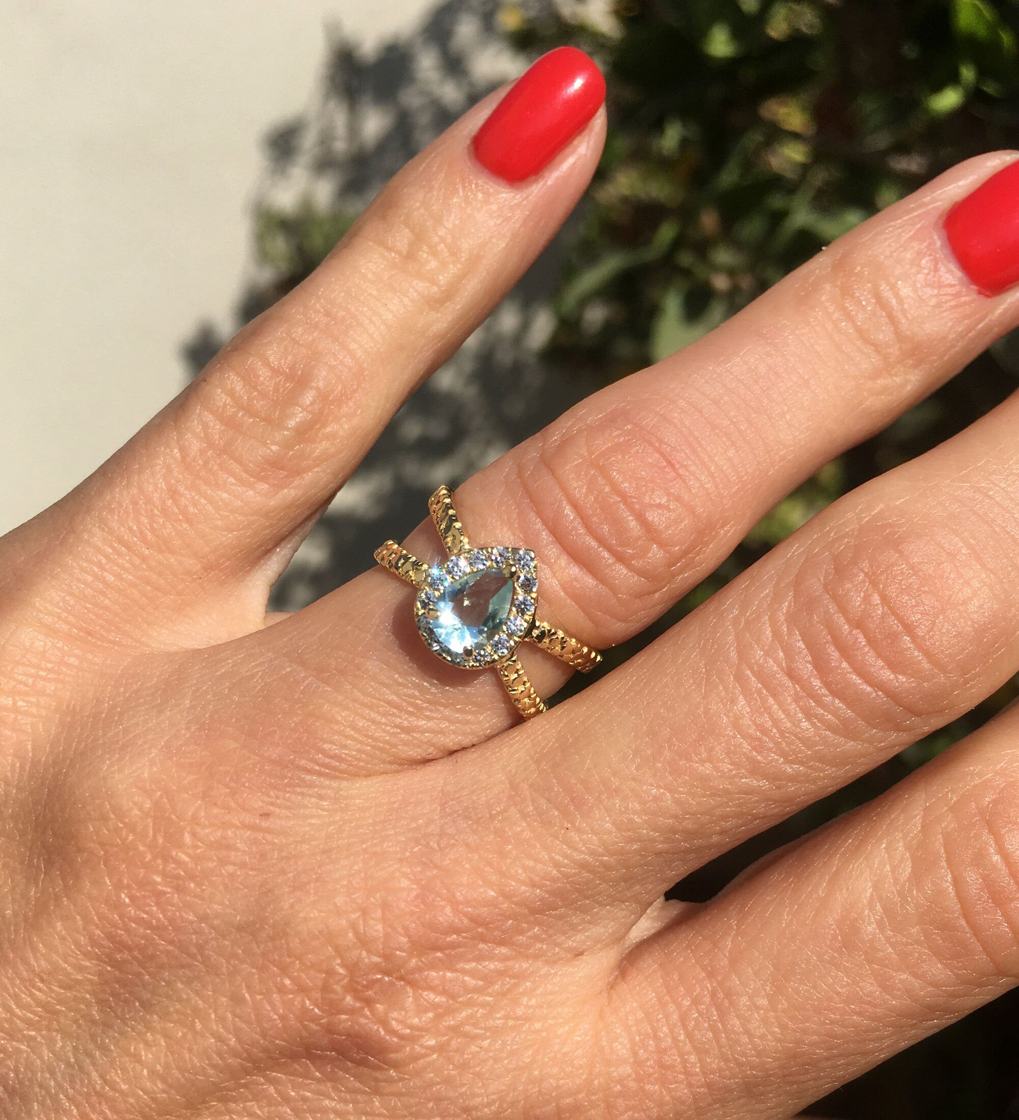 Pear-Shaped Aquamarine Ring with Clear Quartz Halo - H.L.Jewelry