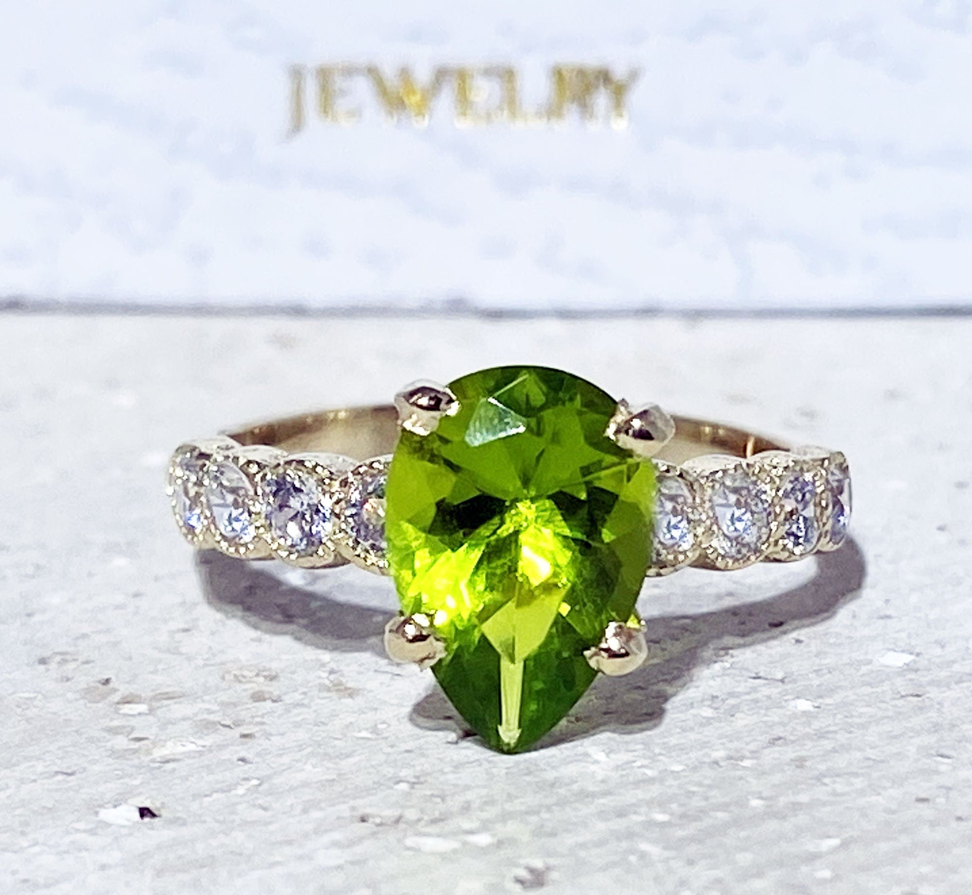Pear-Shaped Peridot Engagement Ring with Clear Quartz Accents - H.L.Jewelry