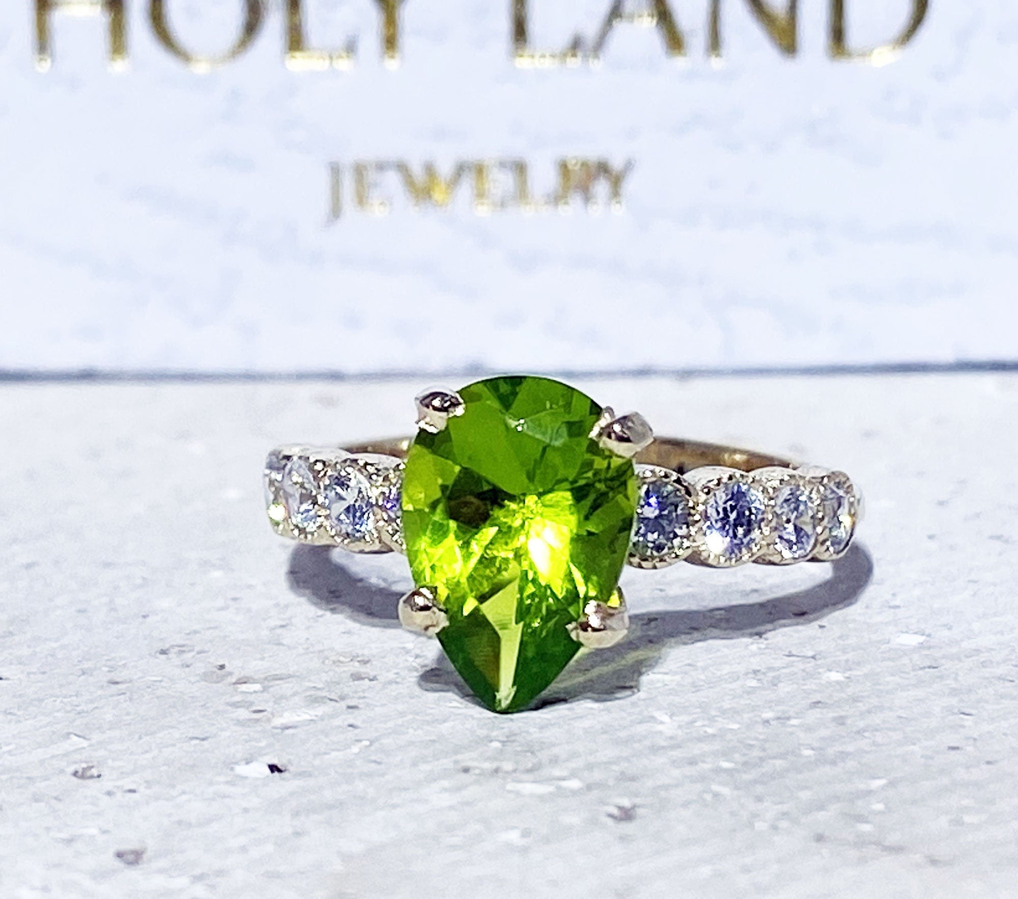 Pear-Shaped Peridot Engagement Ring with Clear Quartz Accents - H.L.Jewelry