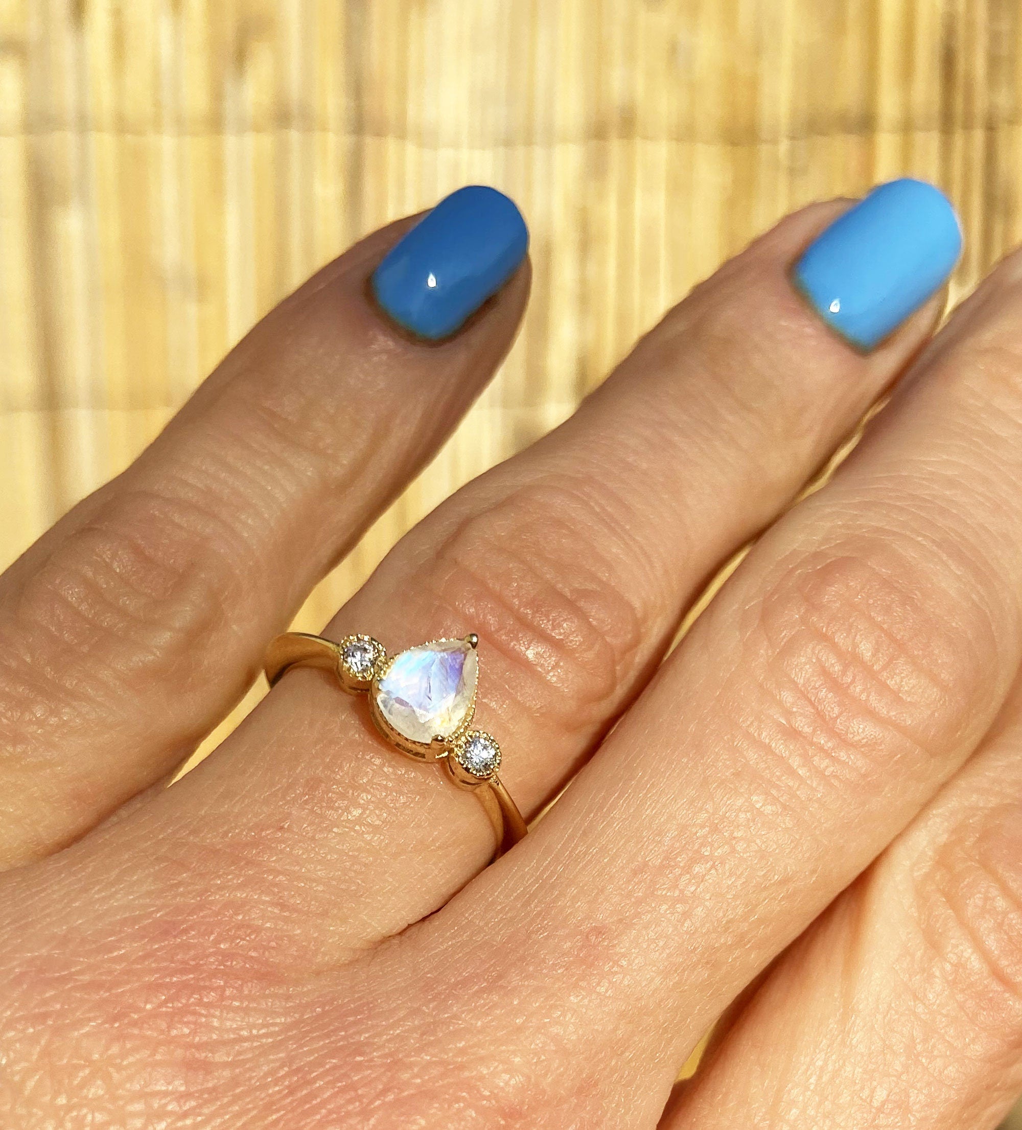 Pear-Shaped Rainbow Moonstone Bezel Ring with Clear Quartz Accents - H.L.Jewelry