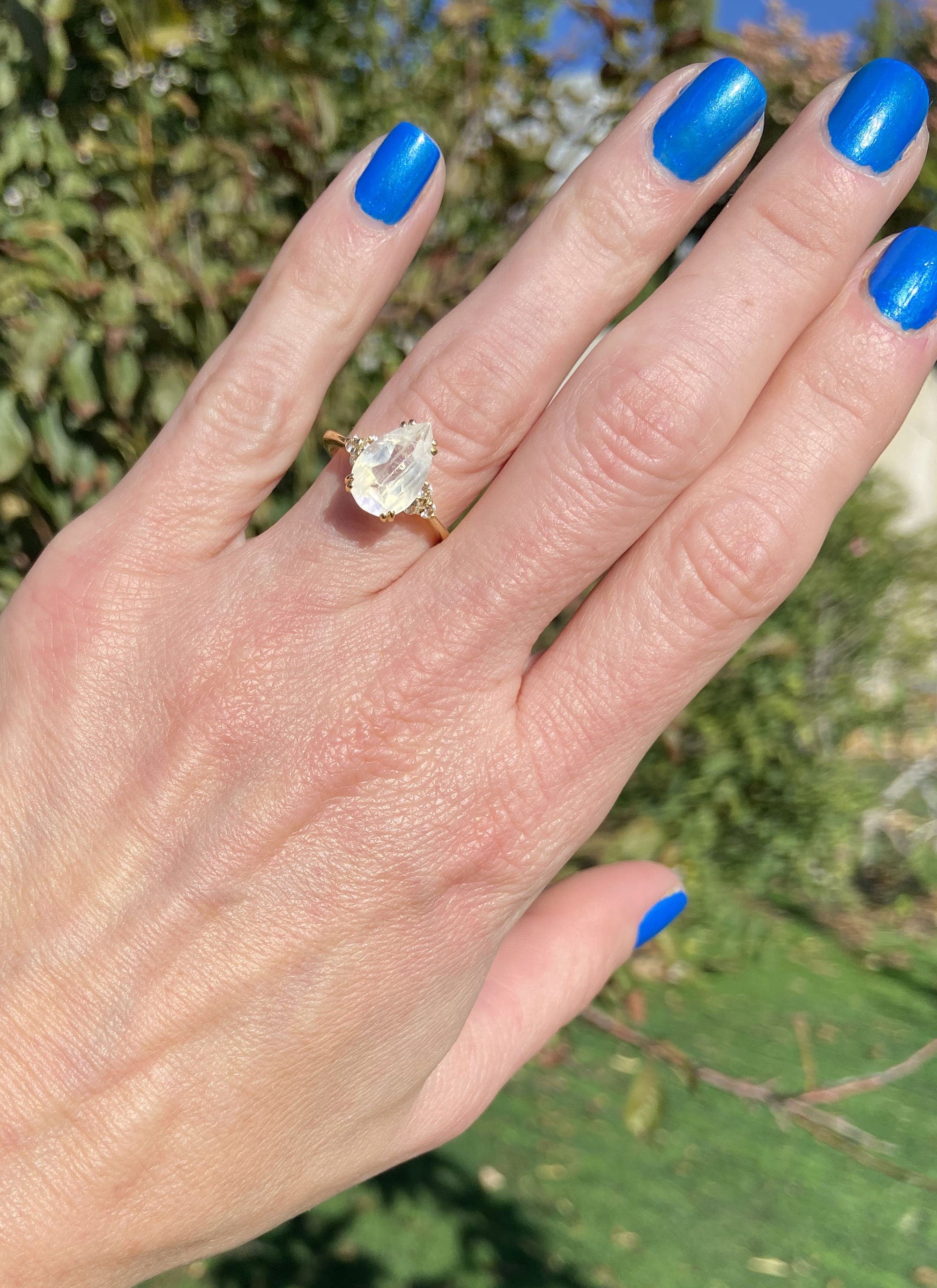 Pear-Shaped Rainbow Moonstone Engagement Ring with Clear Quartz Accents - H.L.Jewelry