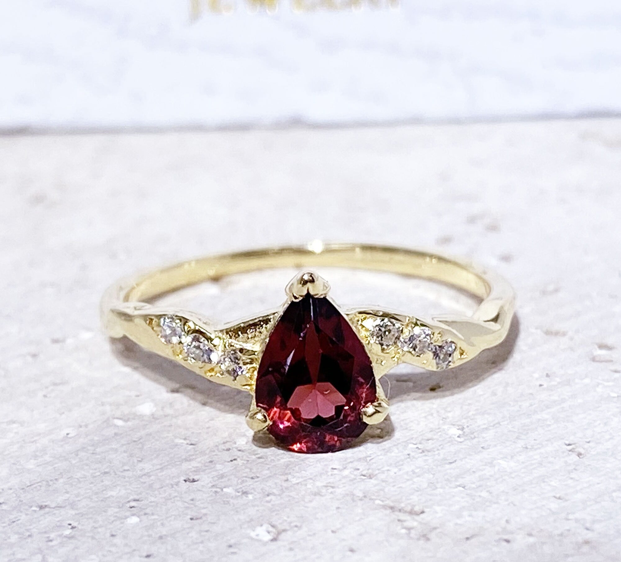 Pear-Shaped Red Garnet Delicate Ring with Clear Quartz Trio Accents - H.L.Jewelry
