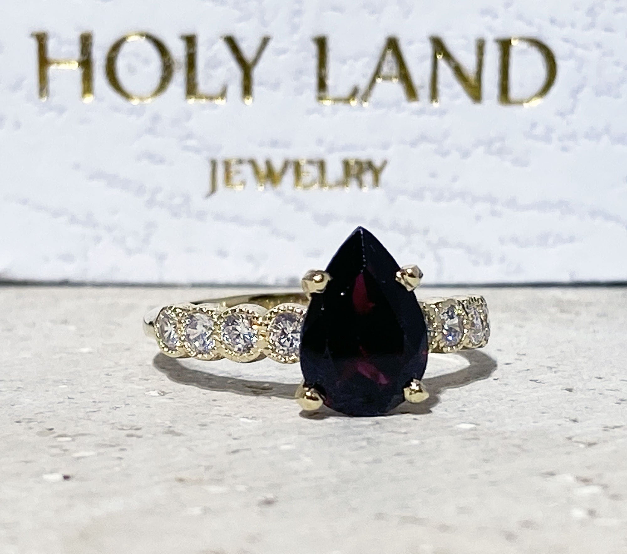 Pear-Shaped Red Garnet Engagement Ring with Clear Quartz Accents - H.L.Jewelry