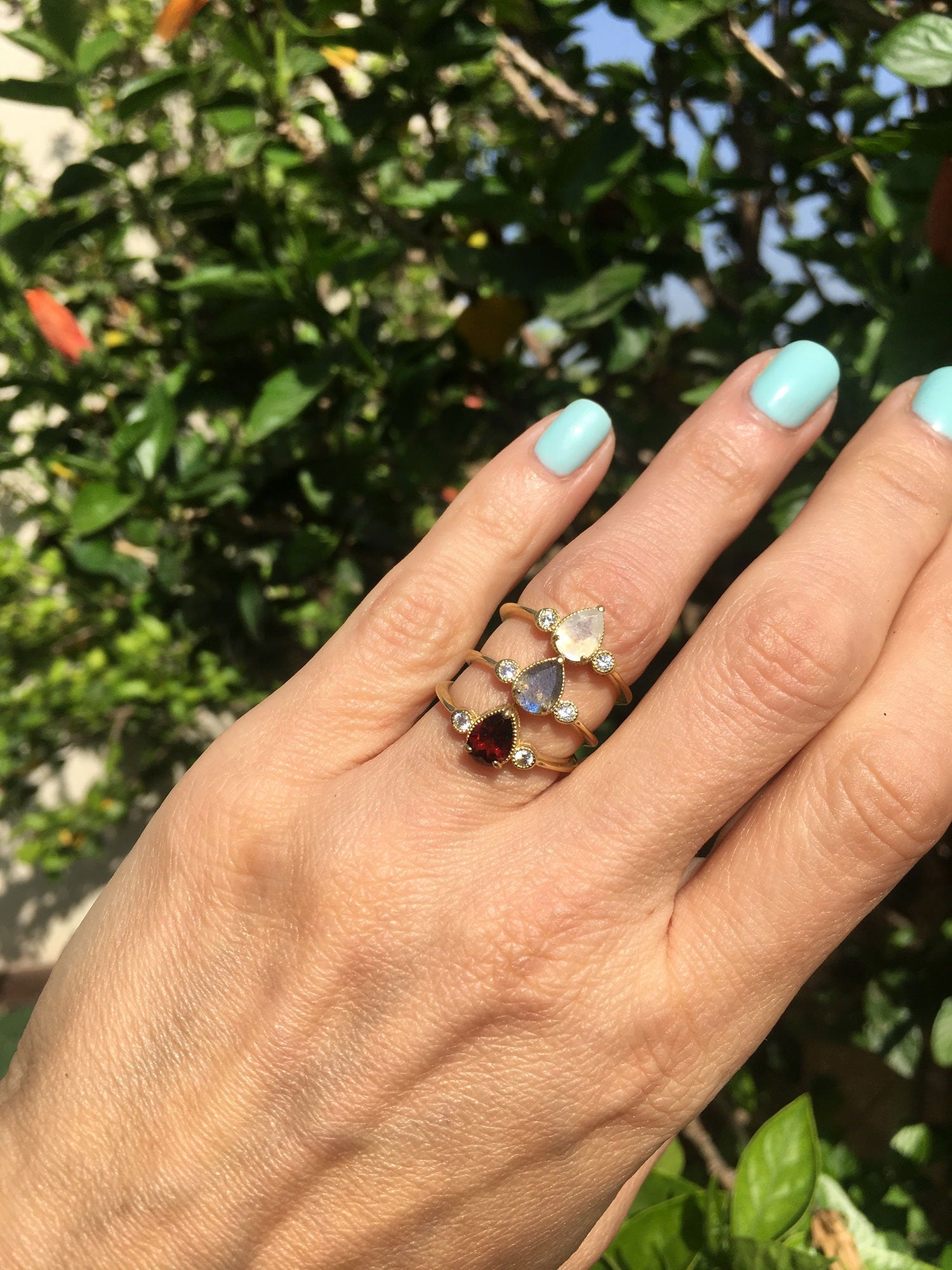 Pear-Shaped Red Garnet Ring with Clear Quartz Accents - H.L.Jewelry