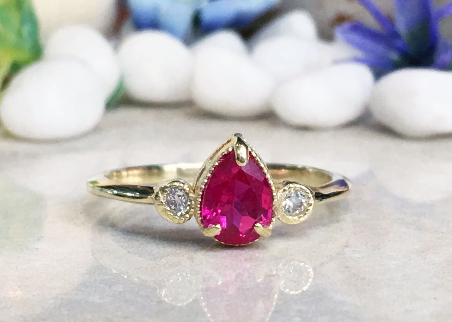 Pear-Shaped Ruby Bezel Ring with Clear Quartz Accents - H.L.Jewelry