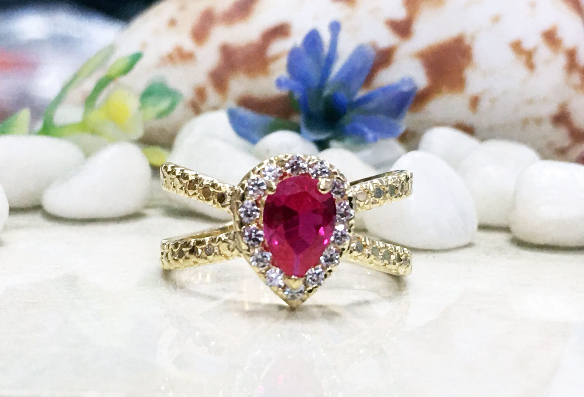 Pear-Shaped Ruby Crossover Ring with Clear Quartz Halo - H.L.Jewelry
