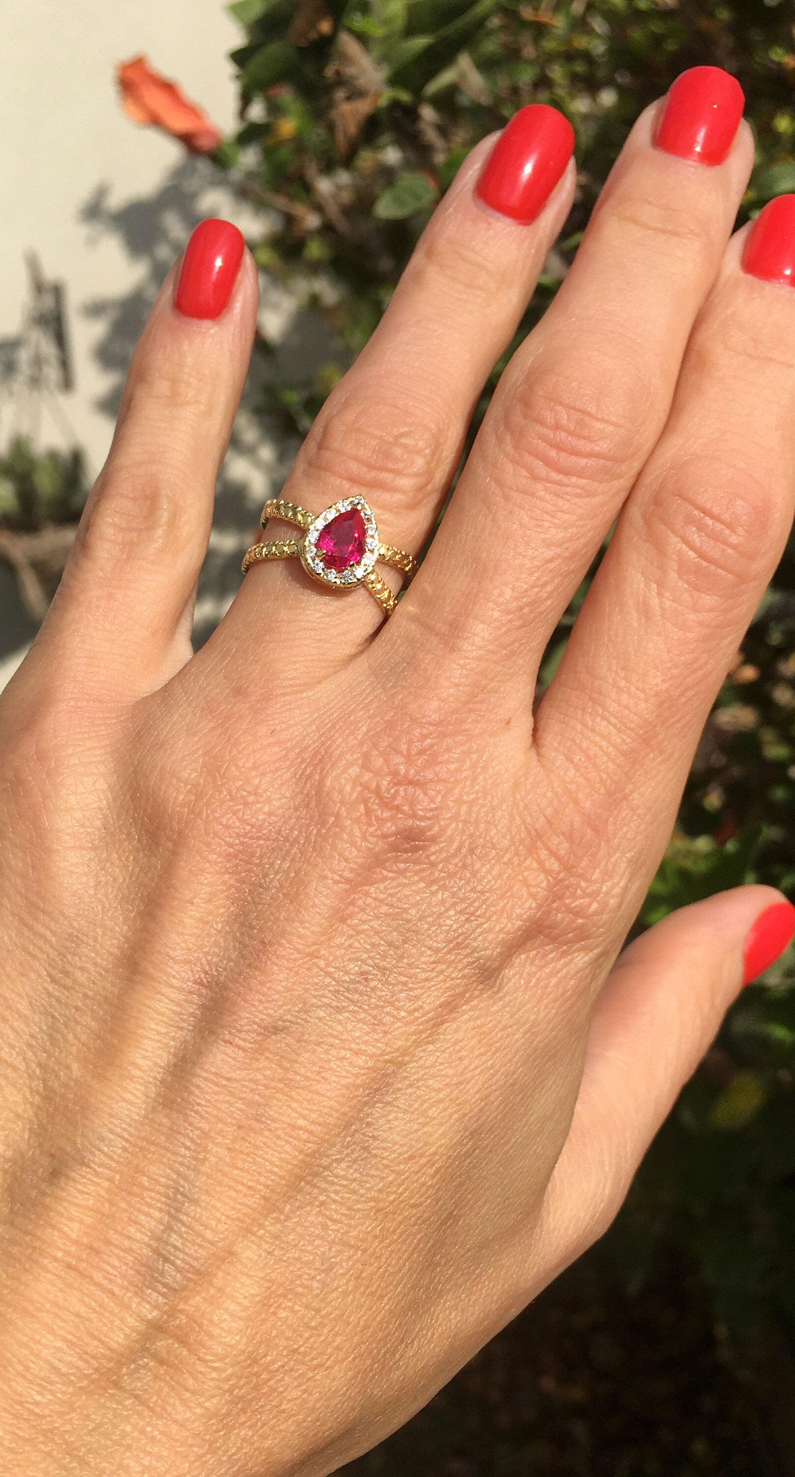 Pear-Shaped Ruby Crossover Ring with Clear Quartz Halo - H.L.Jewelry