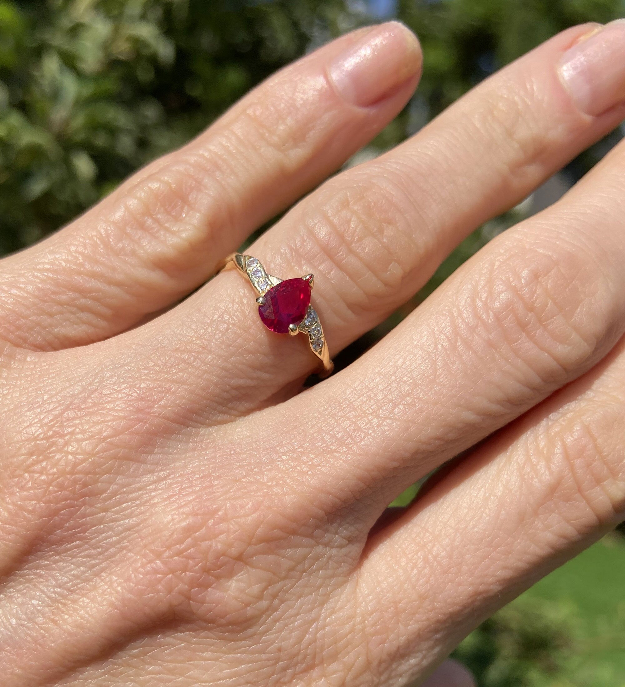 Pear-Shaped Ruby Delicate Ring with Clear Quartz Accents - H.L.Jewelry