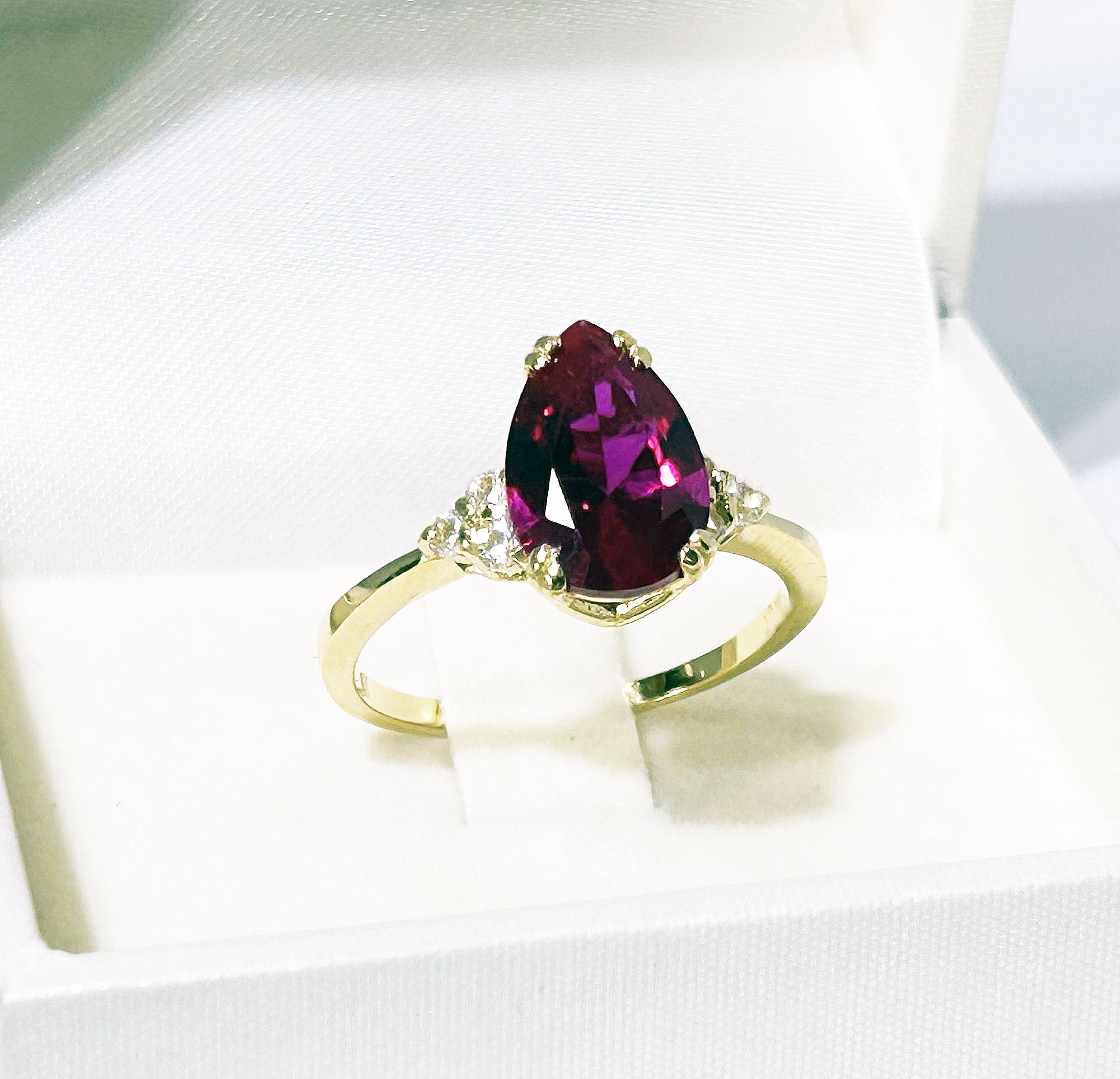 Pear-Shaped Ruby Engagement Ring with Clear Quartz Accents - H.L.Jewelry