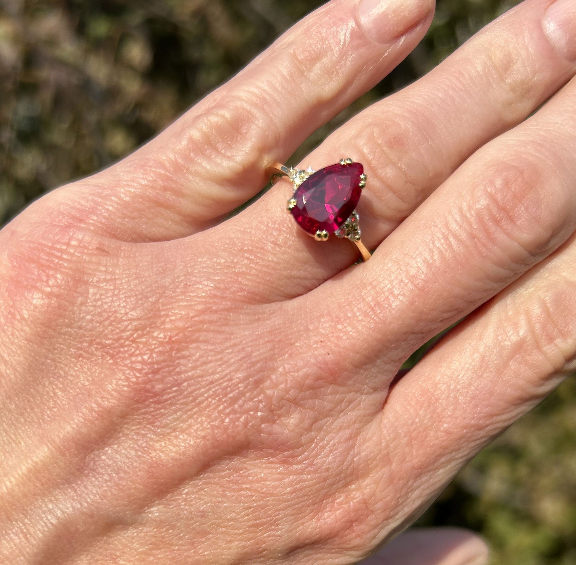 Pear-Shaped Ruby Engagement Ring with Clear Quartz Accents - H.L.Jewelry