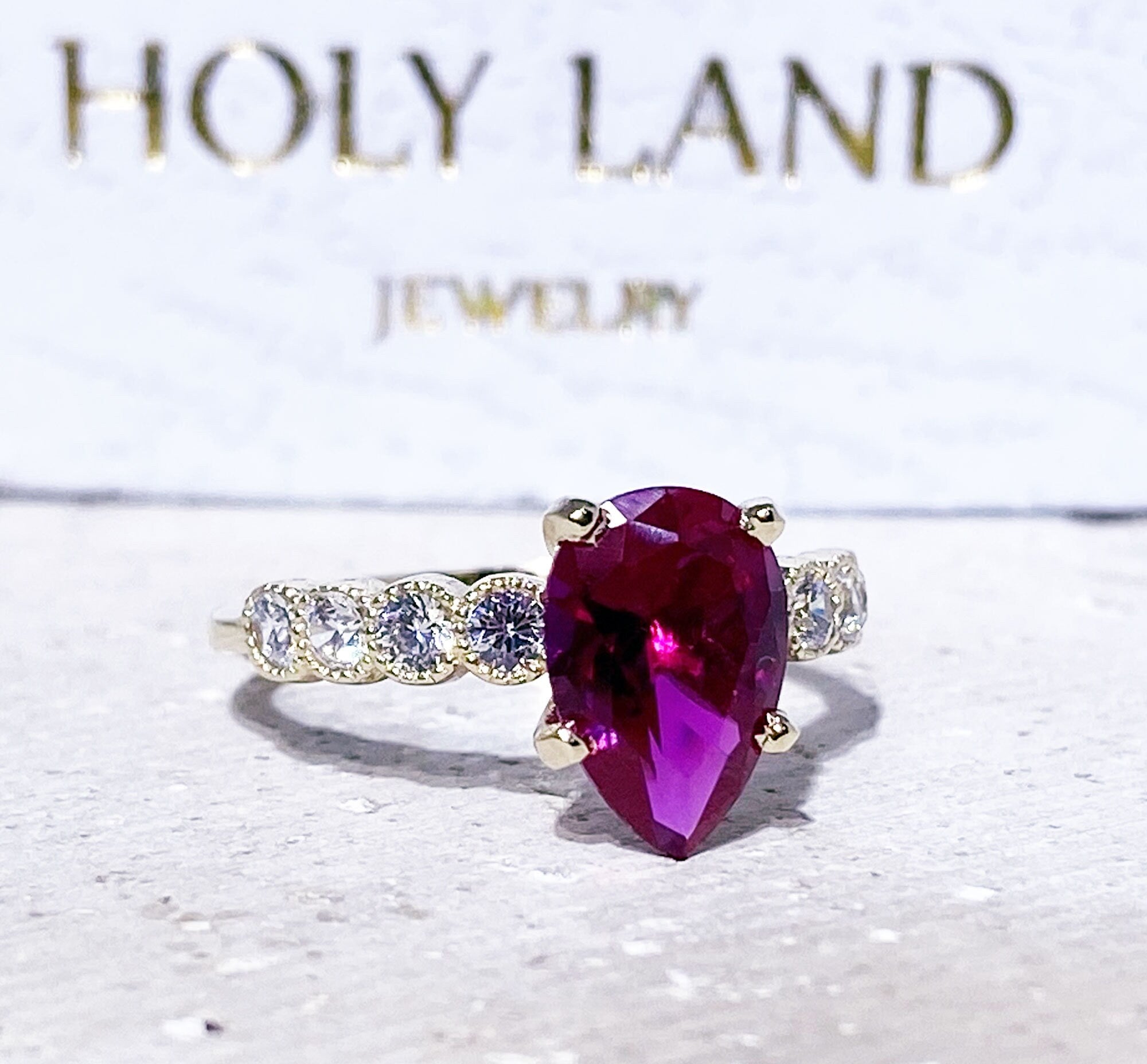 Pear-Shaped Ruby Engagement Ring with Clear Quartz Accents - H.L.Jewelry