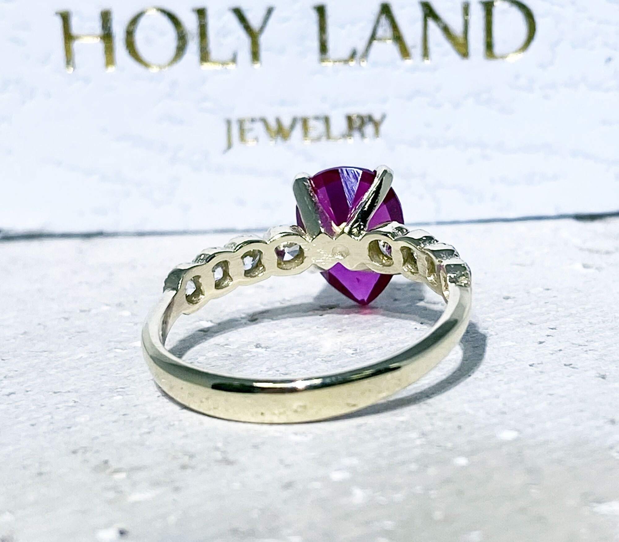Pear-Shaped Ruby Engagement Ring with Clear Quartz Accents - H.L.Jewelry