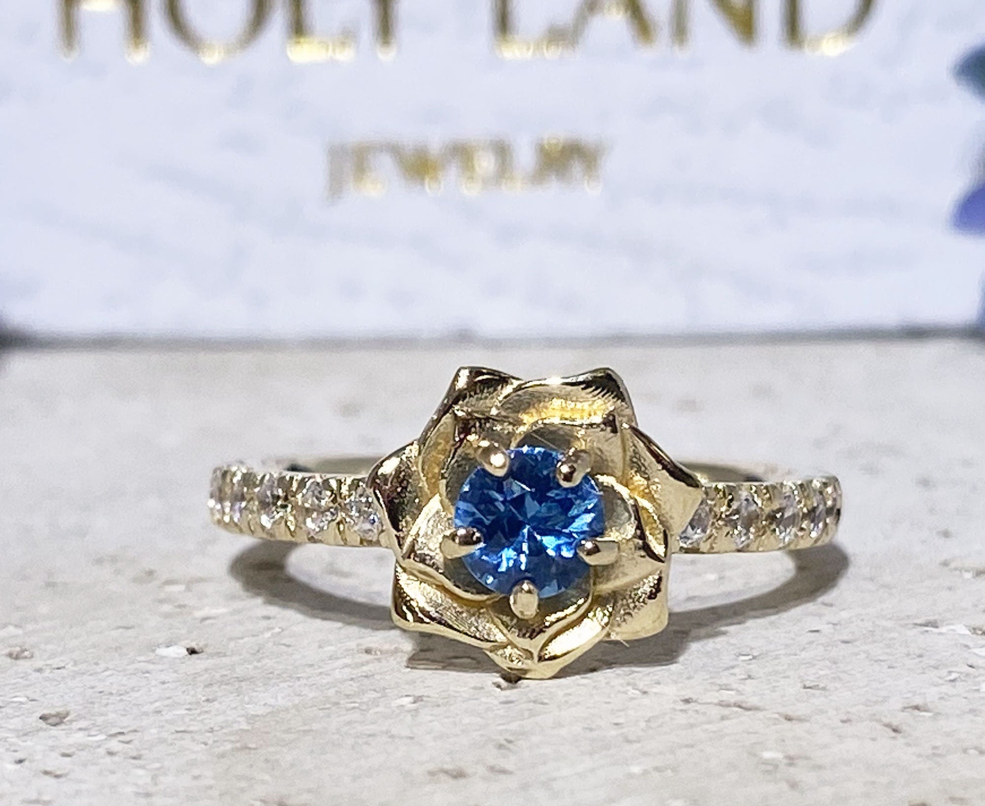 Round Blue Topaz Camellia Ring with Clear Quartz Accents - H.L.Jewelry