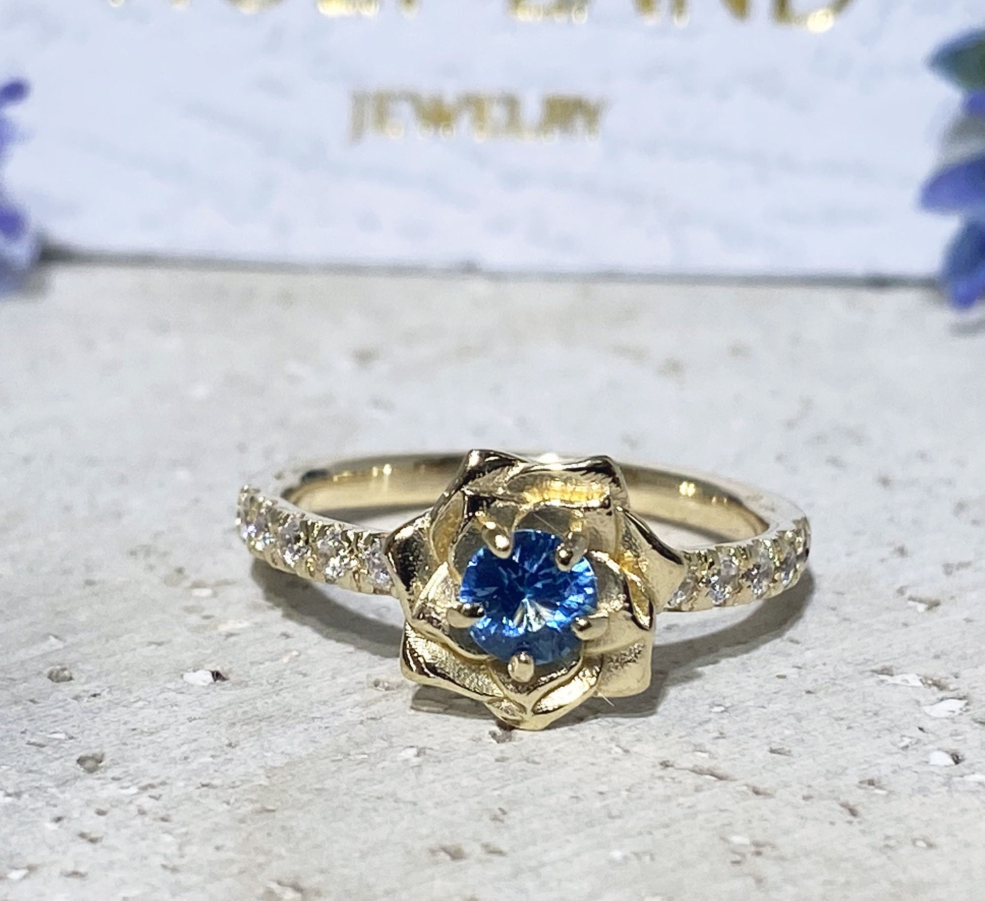 Round Blue Topaz Camellia Ring with Clear Quartz Accents - H.L.Jewelry