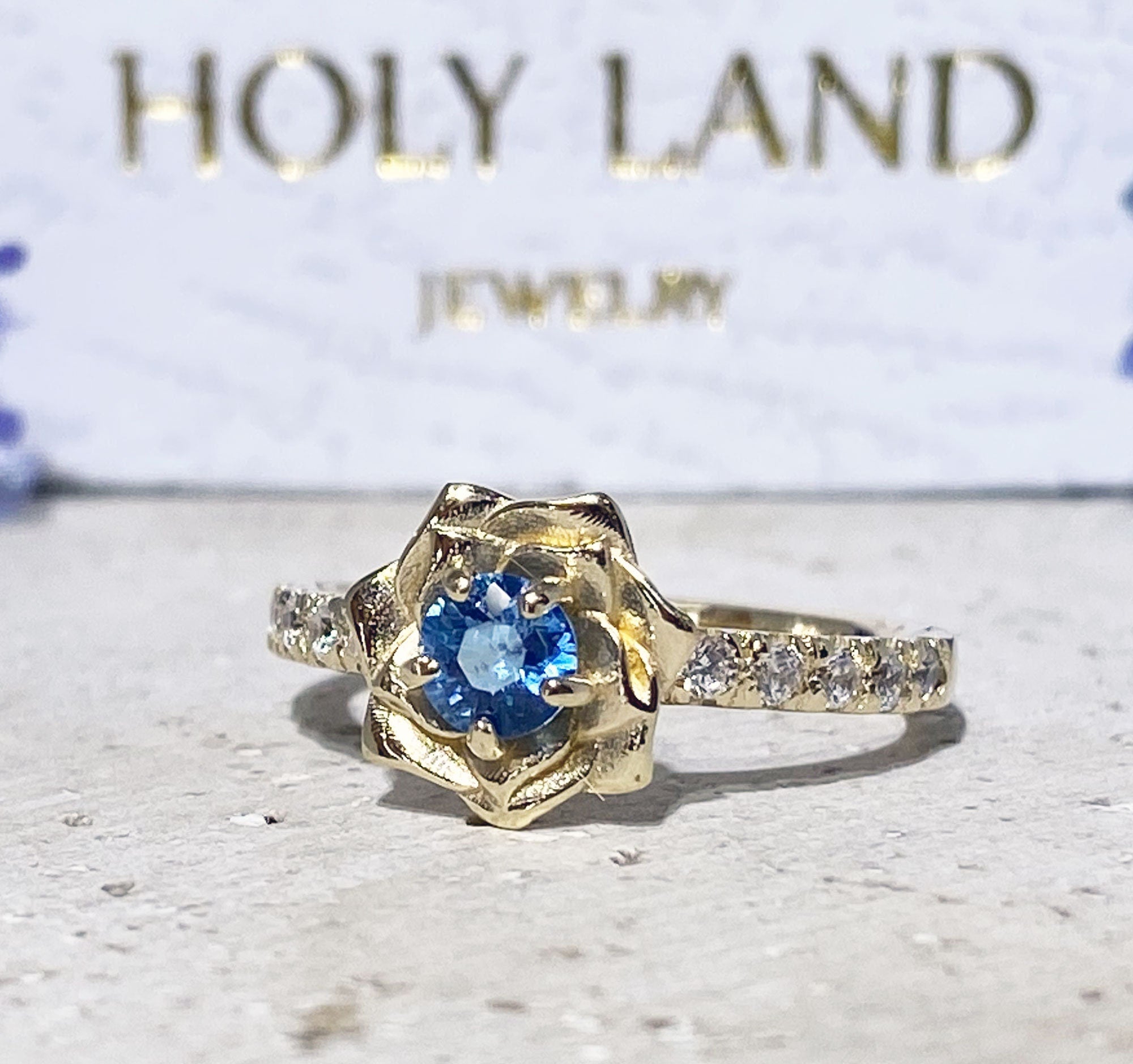 Round Blue Topaz Camellia Ring with Clear Quartz Accents - H.L.Jewelry