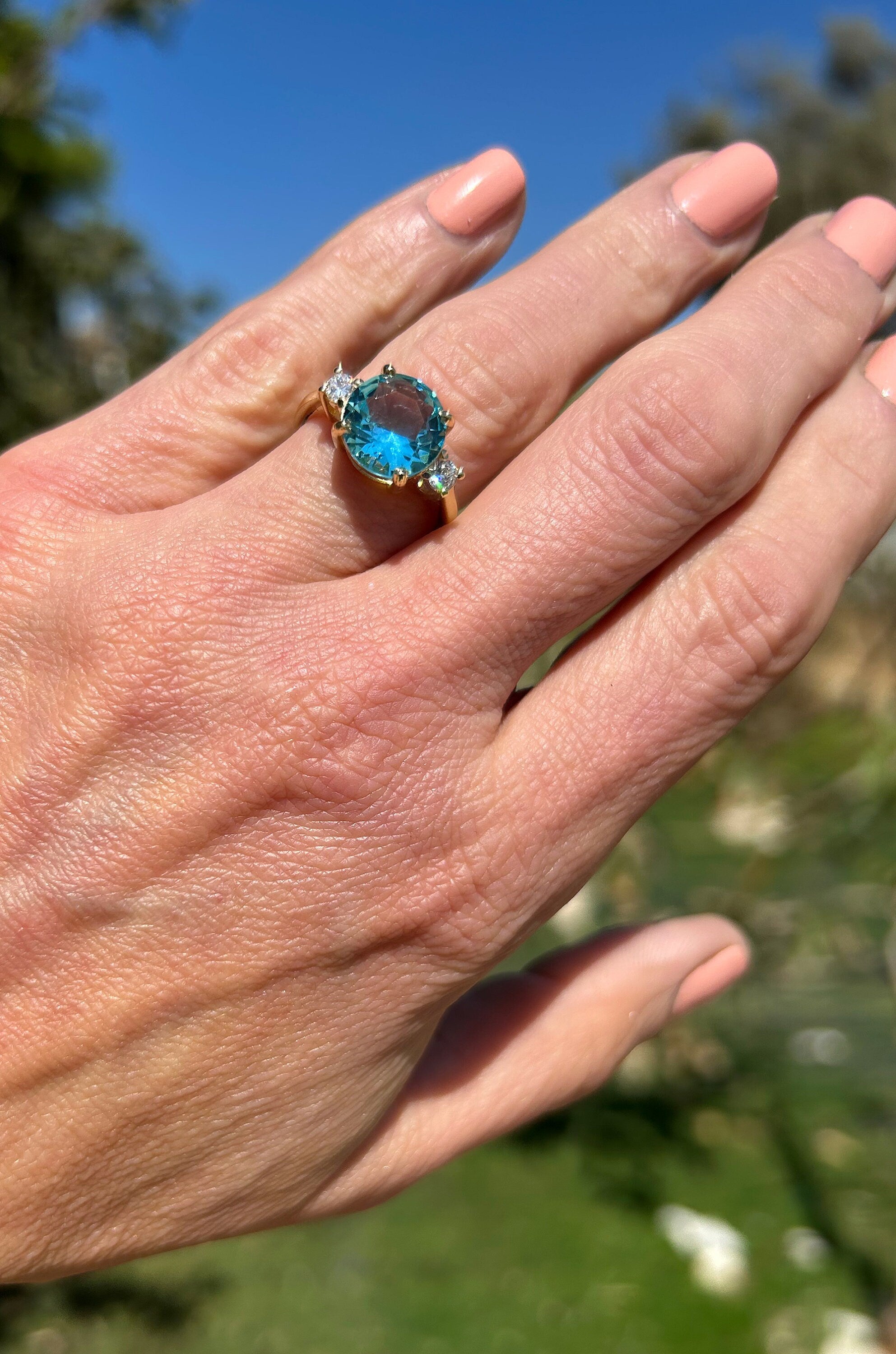 Round Blue Topaz Cocktail Ring with Clear Quartz Accents - H.L.Jewelry