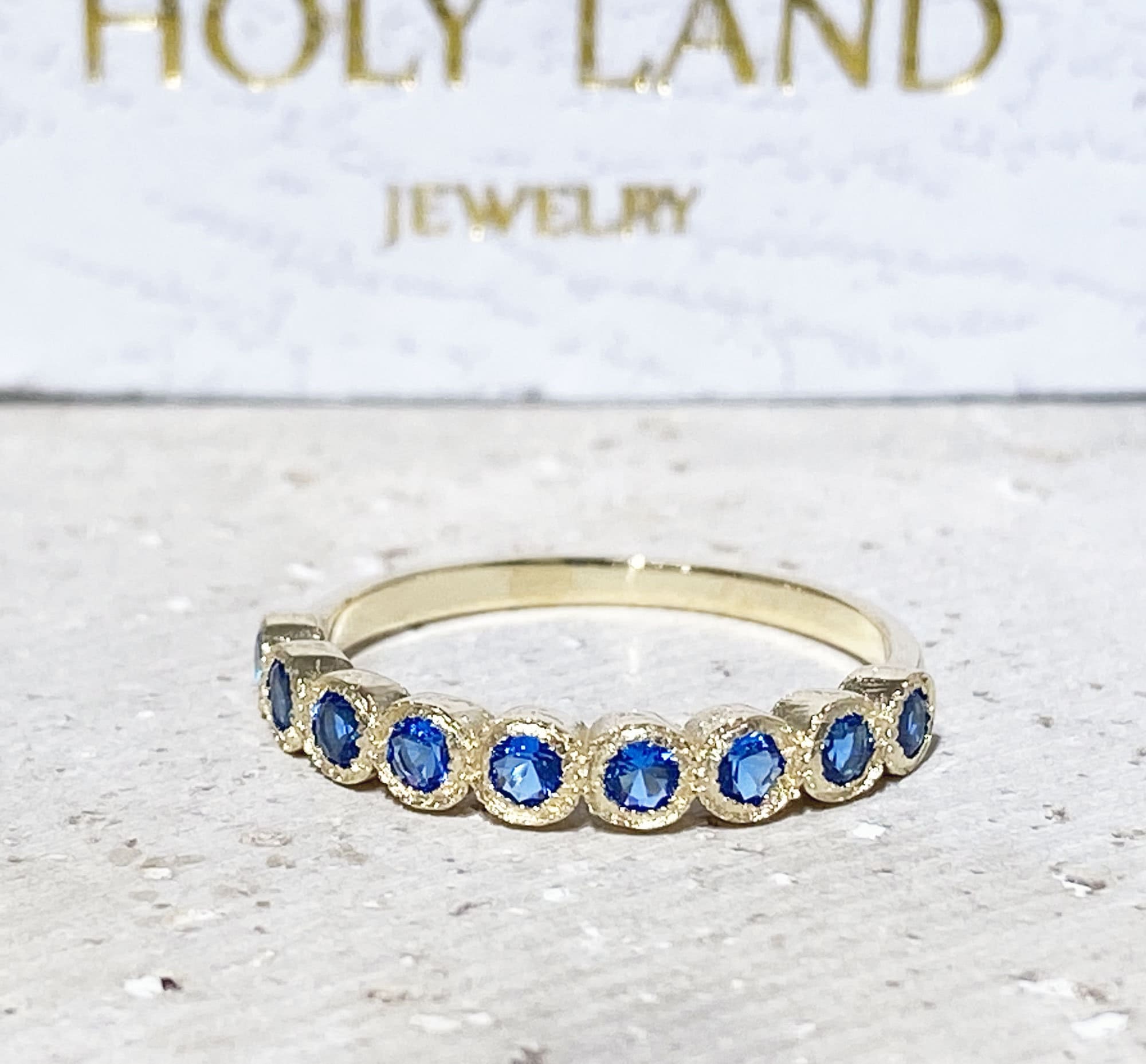 Round Blue Topaz Nine Stone Stacking Half Eternity Bezel Ring - H.L.Jewelry