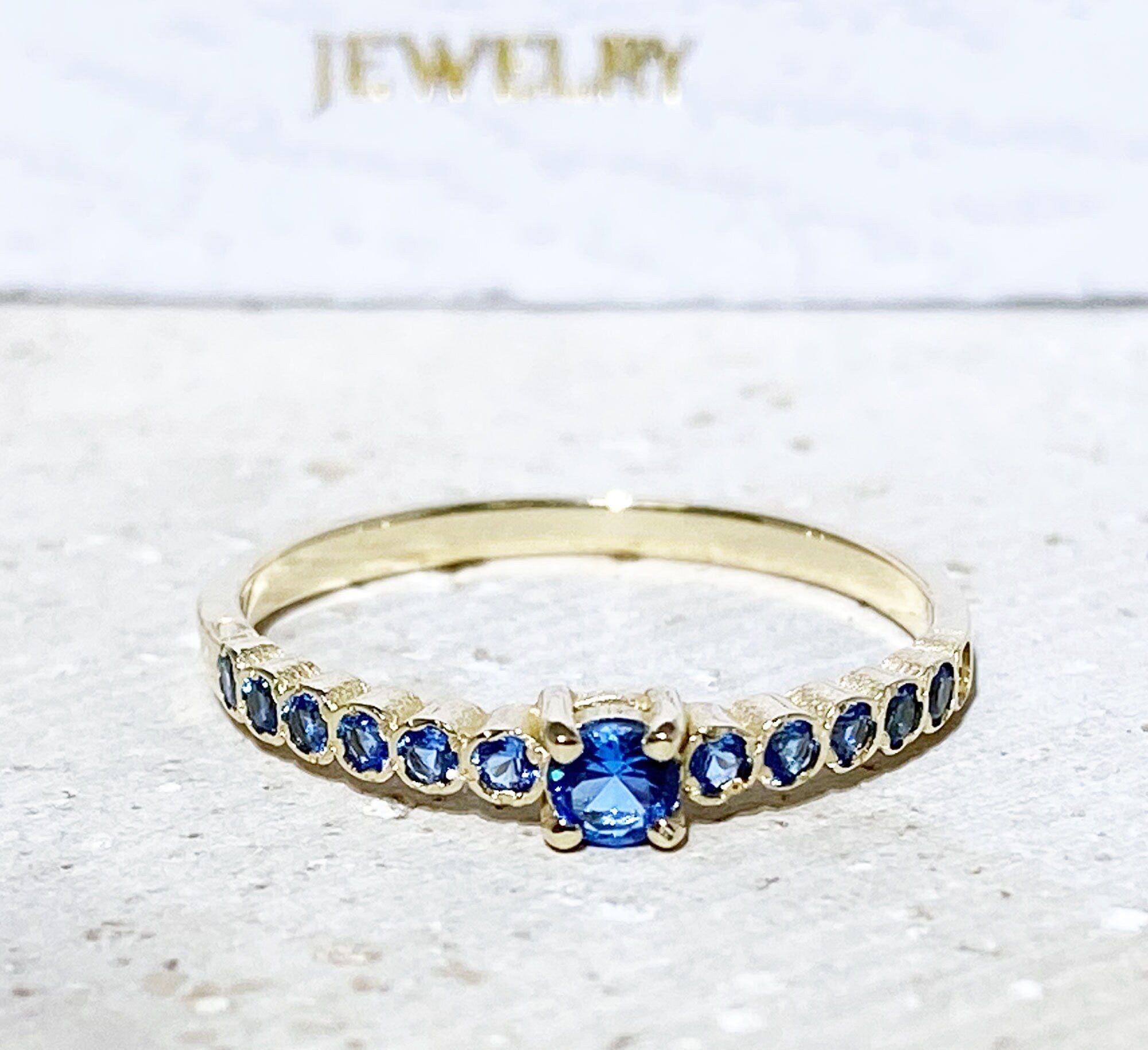 Round Blue Topaz Thirteen-Stone Stackable Half Eternity Ring - H.L.Jewelry
