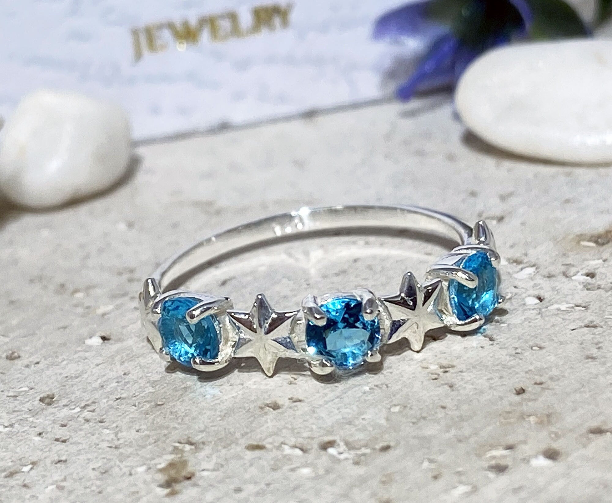Round Blue Topaz Three Stone Ring with Star Accents - H.L.Jewelry