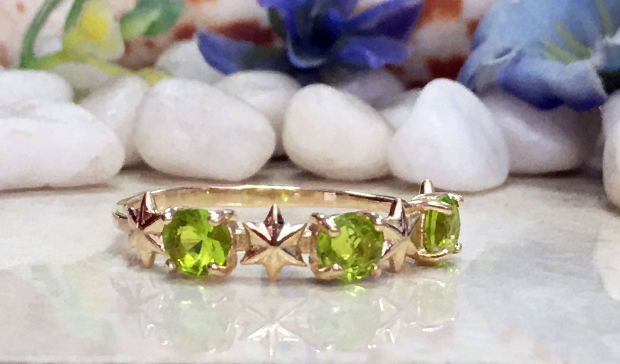 Round Peridot Three Stone Ring with Star Accents - H.L.Jewelry