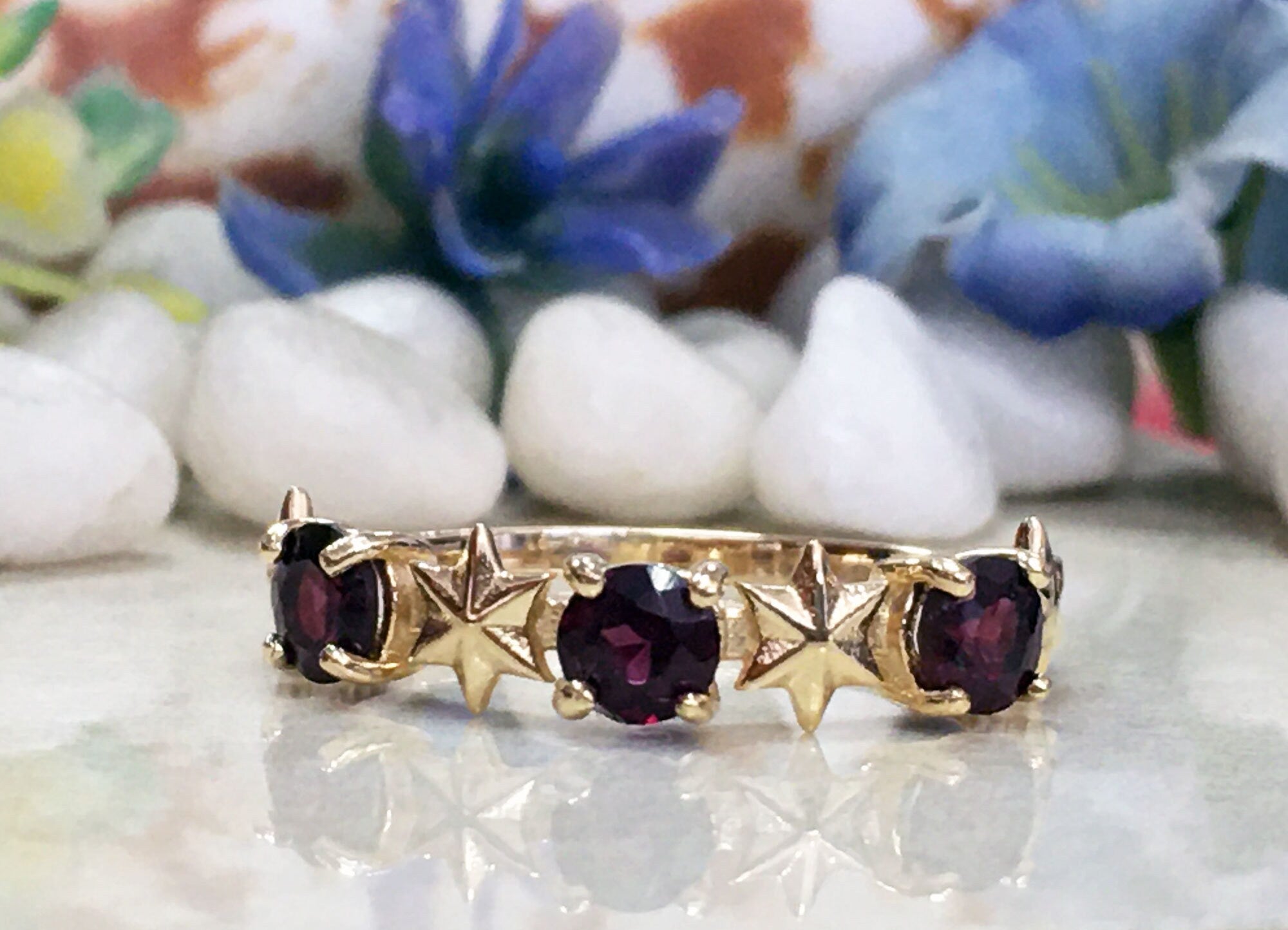 Round Red Garnet Three Stone Ring with Star Accents - H.L.Jewelry