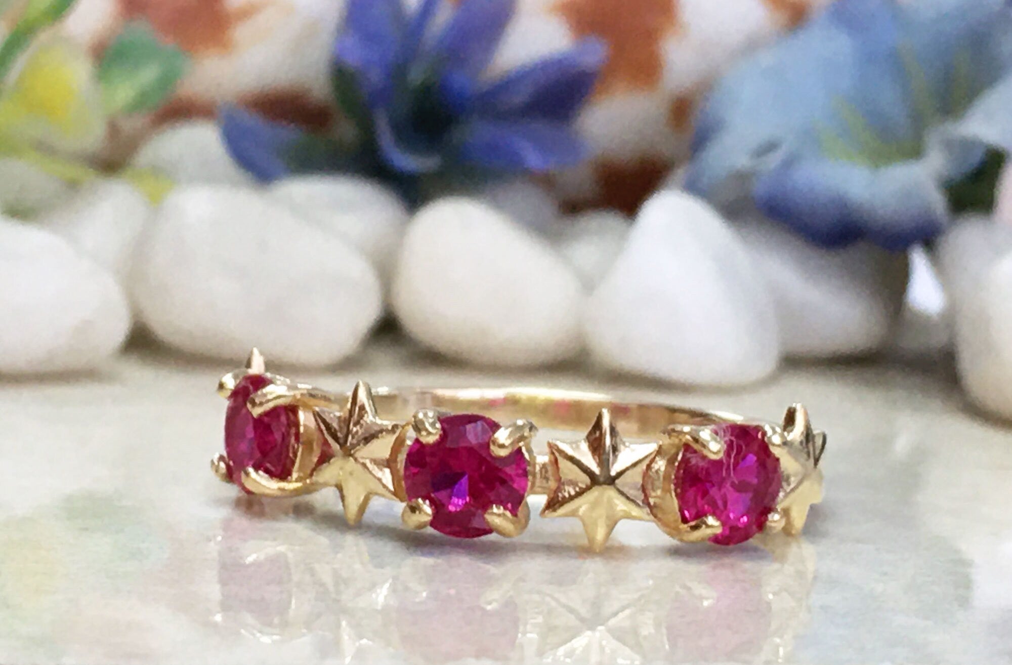 Round Ruby Three-Stone Ring with Star Accents - H.L.Jewelry