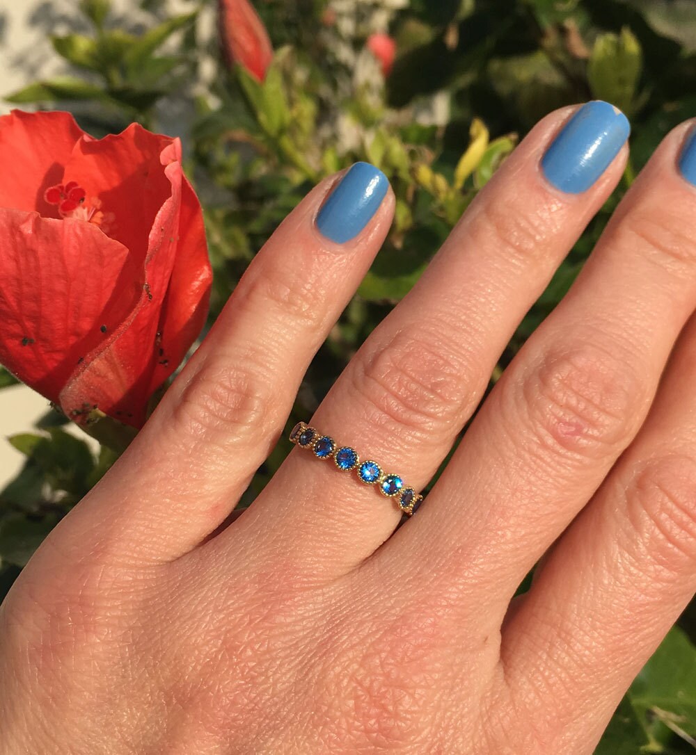 Blue Topaz Ring - December Birthstone - Delicate Stacking Half Eternity Ring with Nine Round Blue Topaz Gemstones - H.L.Jewelry