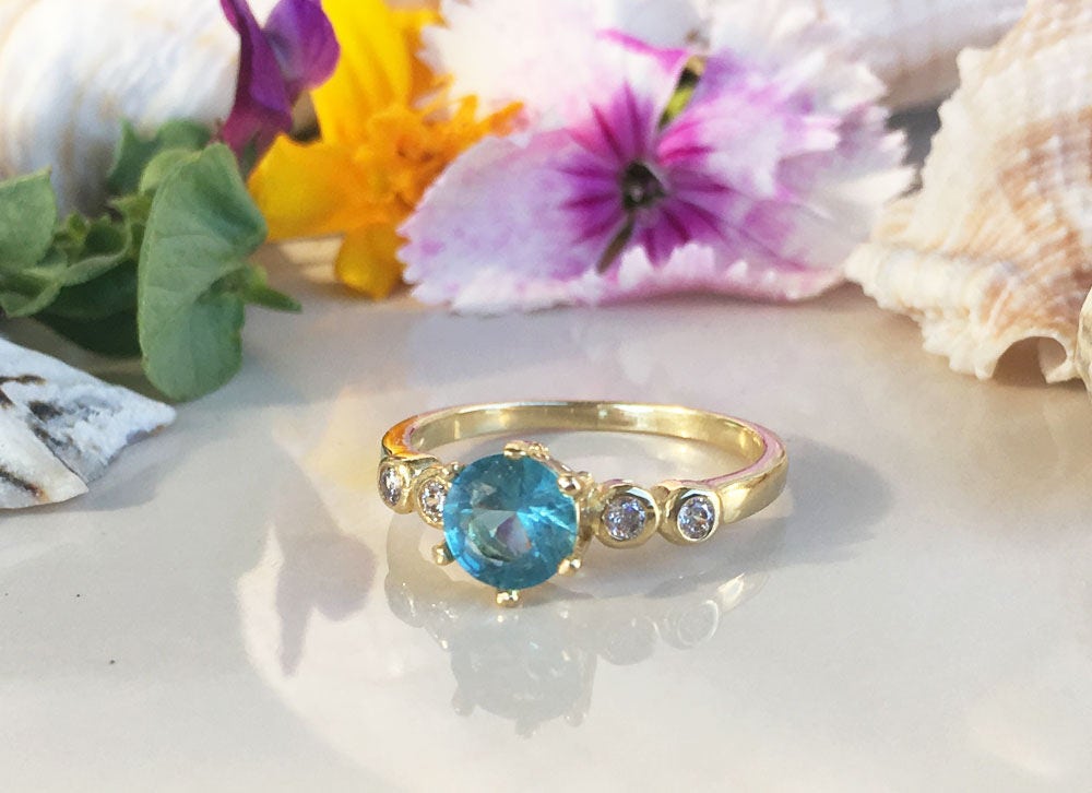 Blue Topaz Ring - December Birthstone - Tiny Delicate Ring with Round Blue Topaz Gemstone and Clear Quartz Accents - H.L.Jewelry