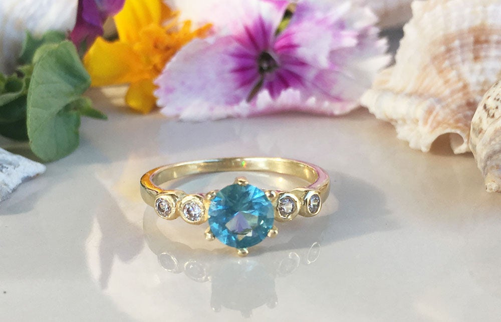 Blue Topaz Ring - December Birthstone - Tiny Delicate Ring with Round Blue Topaz Gemstone and Clear Quartz Accents - H.L.Jewelry