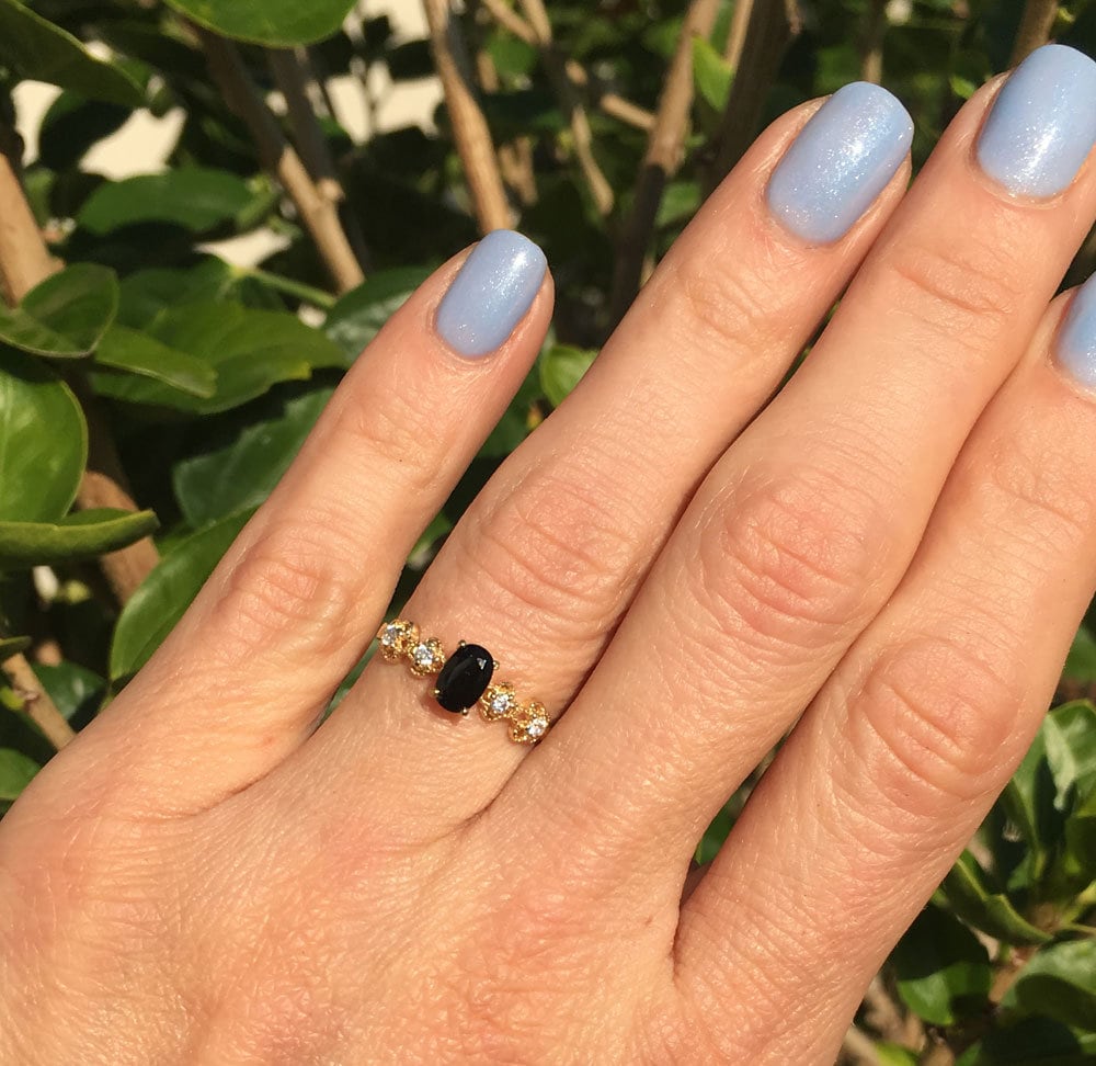 Black Onyx Ring - December Birthstone - Delicate Ring with Oval Black Onyx Middle Gemstone and Flower Setting with Clear Quartz Accents - H.L.Jewelry