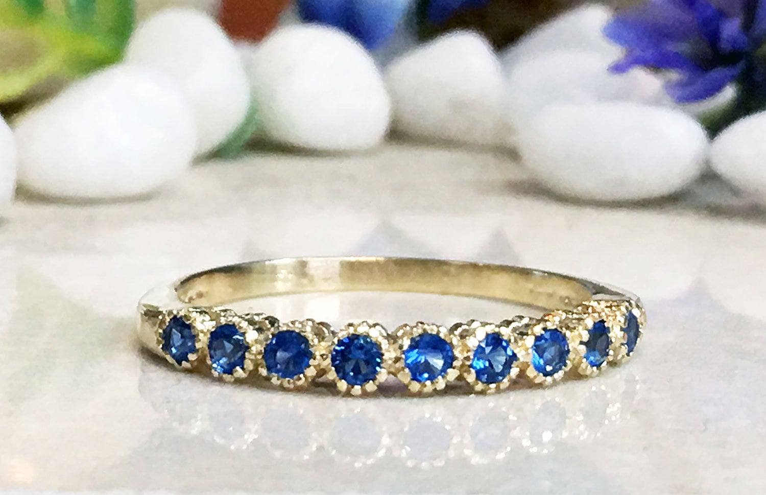 Blue Topaz Ring - December Birthstone - Stacking Ring with Nine Round Blue Topaz Gemstones - H.L.Jewelry