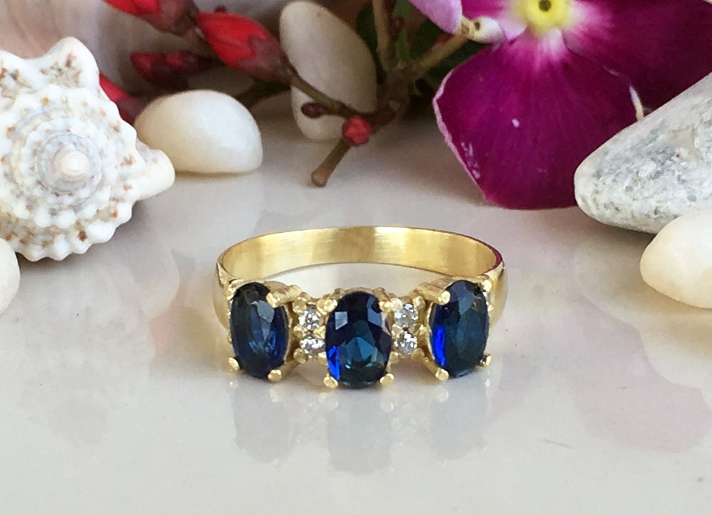 Blue Sapphire Ring - September Birthstone - Ring with Three Oval Blue Sapphire Gemstones and Clear Quartz Accents - H.L.Jewelry