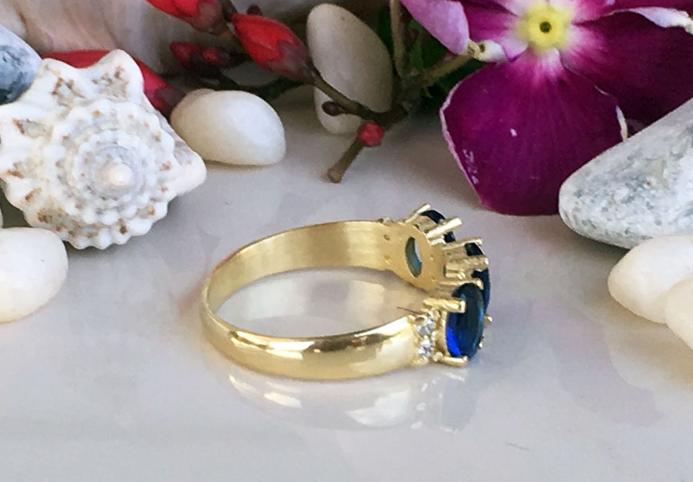 Blue Sapphire Ring - September Birthstone - Ring with Three Oval Blue Sapphire Gemstones and Clear Quartz Accents - H.L.Jewelry