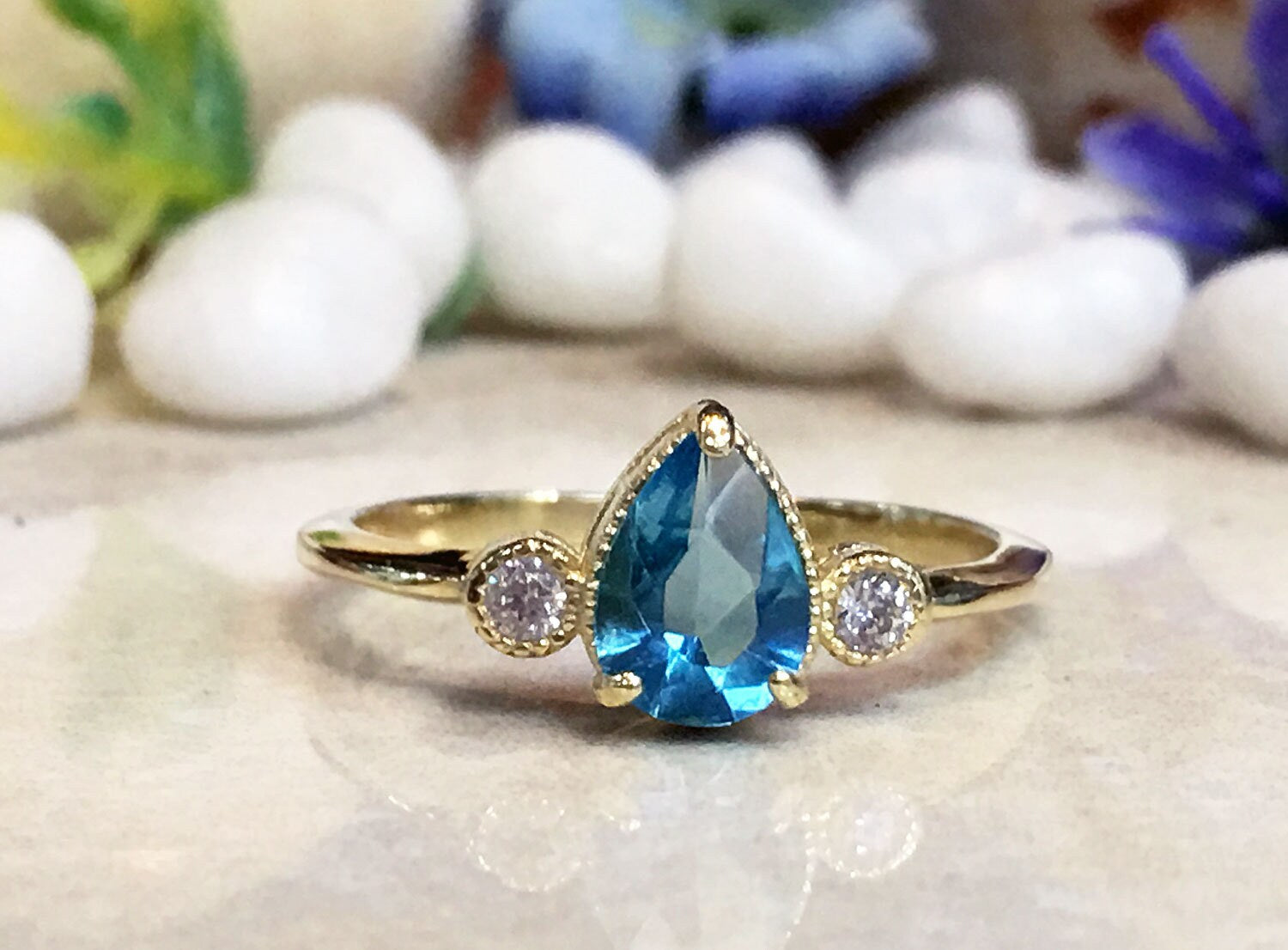 Blue Topaz Ring - December Birthstone - Tiny Delicate Ring with Pear-Shaped Blue Topaz Gemstone and Clear Quartz Accents - H.L.Jewelry