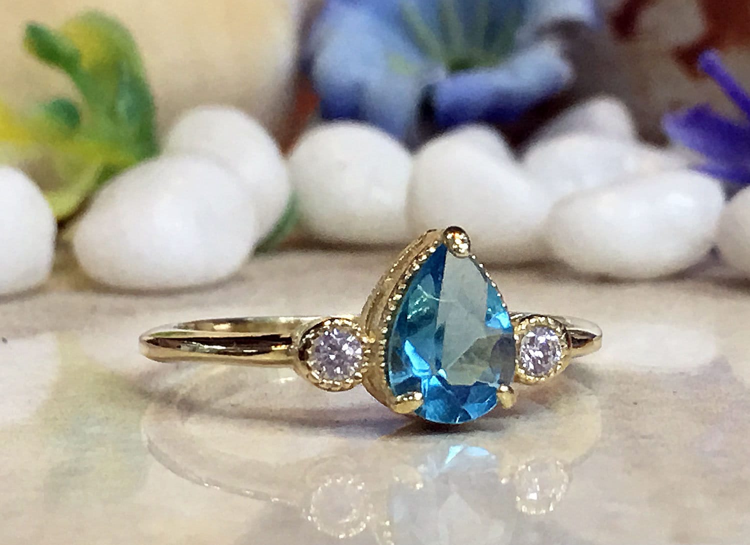 Blue Topaz Ring - December Birthstone - Tiny Delicate Ring with Pear-Shaped Blue Topaz Gemstone and Clear Quartz Accents - H.L.Jewelry