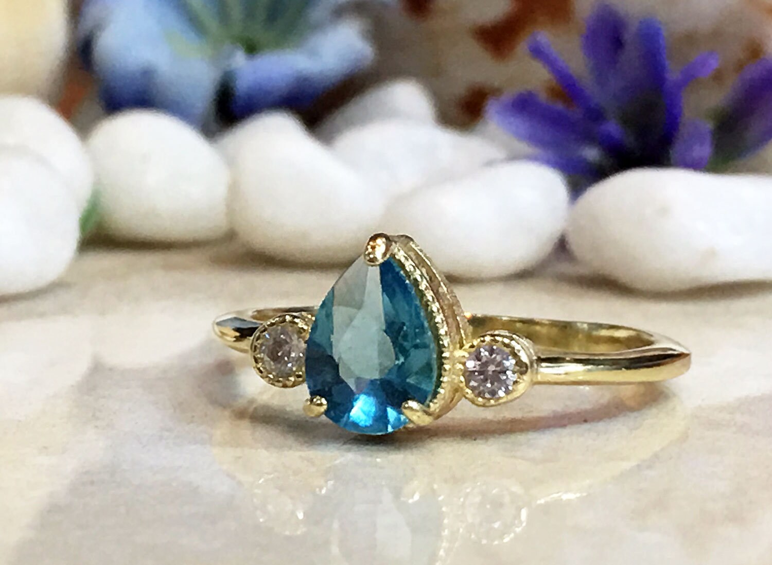 Blue Topaz Ring - December Birthstone - Tiny Delicate Ring with Pear-Shaped Blue Topaz Gemstone and Clear Quartz Accents - H.L.Jewelry