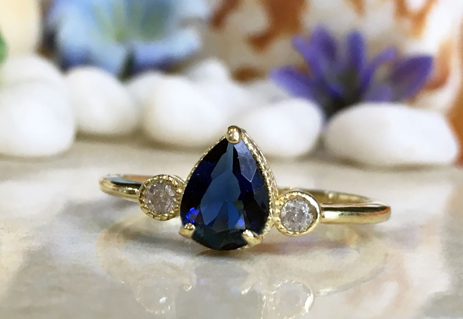 Blue Sapphire Ring - September Birthstone - Delicate Ring with Pear Shape Blue Sapphire Gemstone and Clear Quartz Accents - H.L.Jewelry