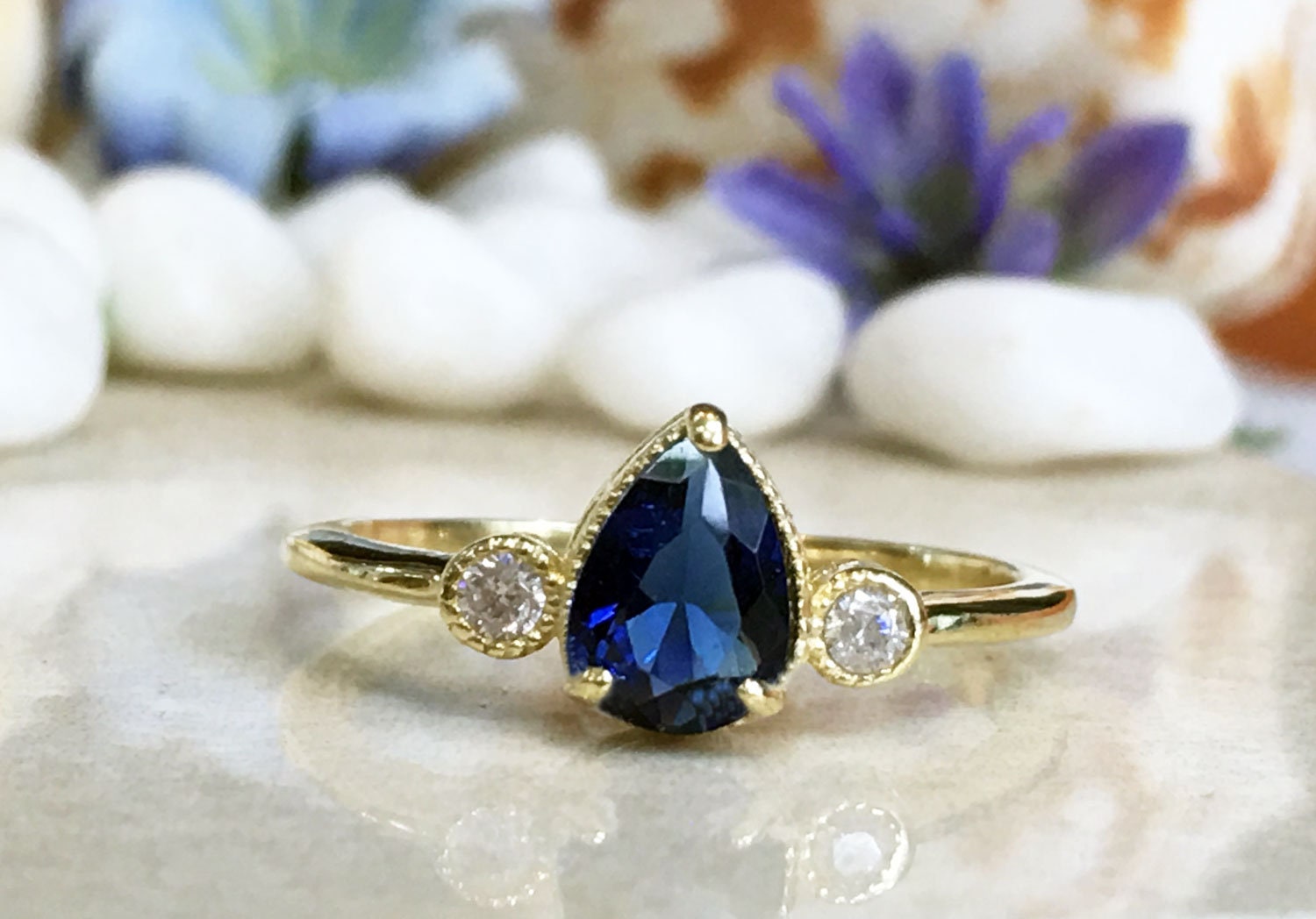 Blue Sapphire Ring - September Birthstone - Delicate Ring with Pear Shape Blue Sapphire Gemstone and Clear Quartz Accents - H.L.Jewelry