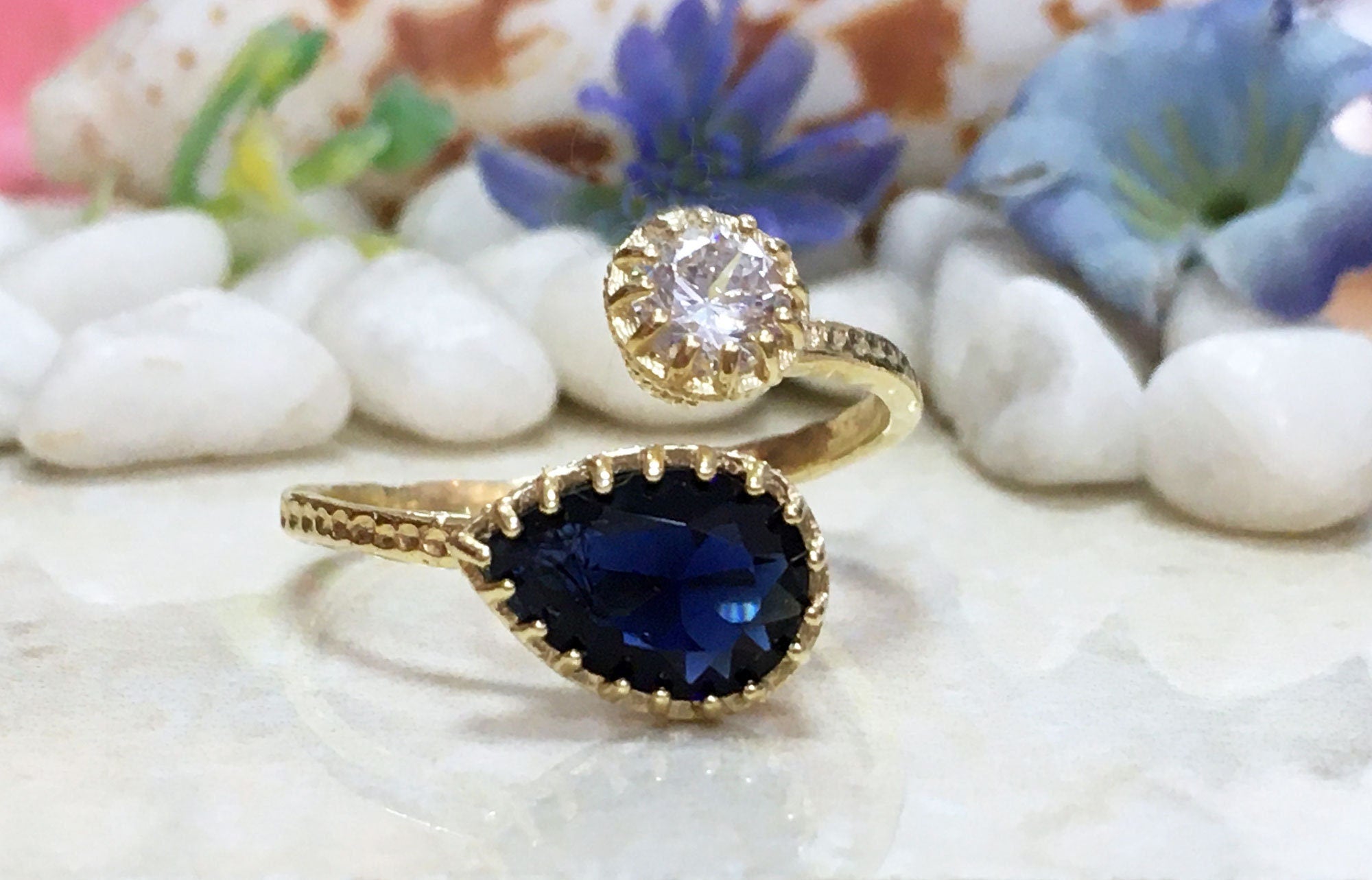 Dual Gemstone Ring - Two Birthstone Ring - Hammered Band Ring with Pear-Shaped Blue Sapphire Gemstone and Round Clear Quartz - H.L.Jewelry