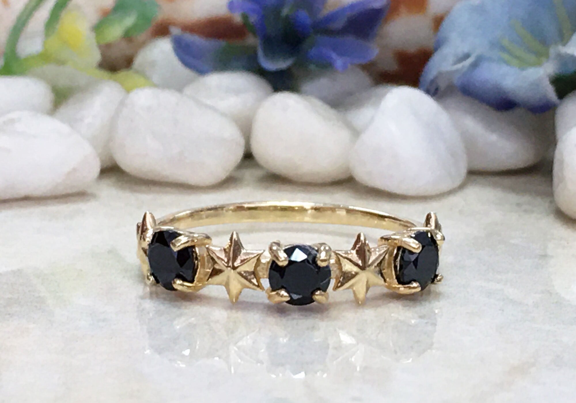 Black Onyx Ring - December Birthstone - Delicate Ring with Three Black Onyx Gemstones and Star Accents - H.L.Jewelry