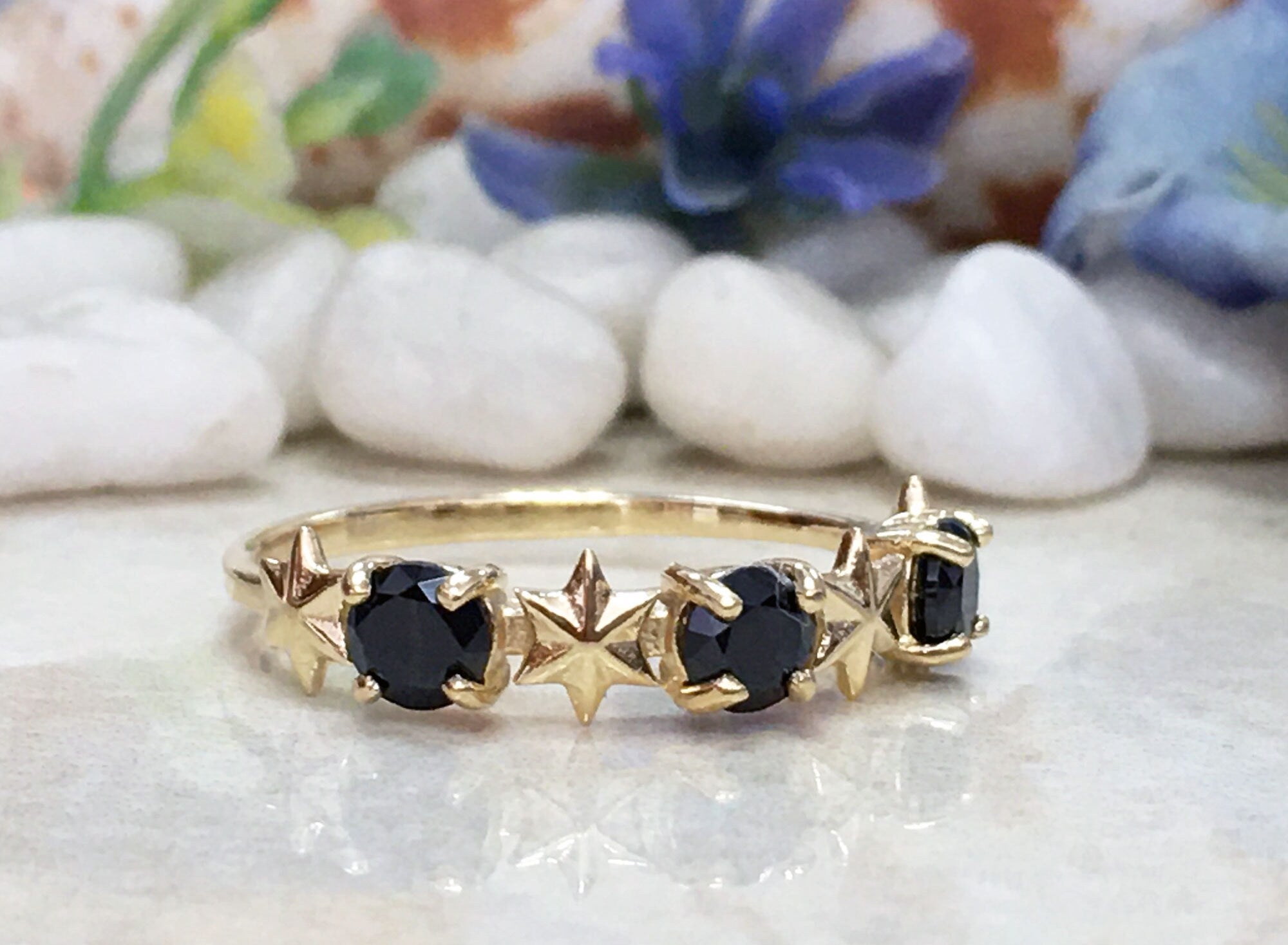 Black Onyx Ring - December Birthstone - Delicate Ring with Three Black Onyx Gemstones and Star Accents - H.L.Jewelry