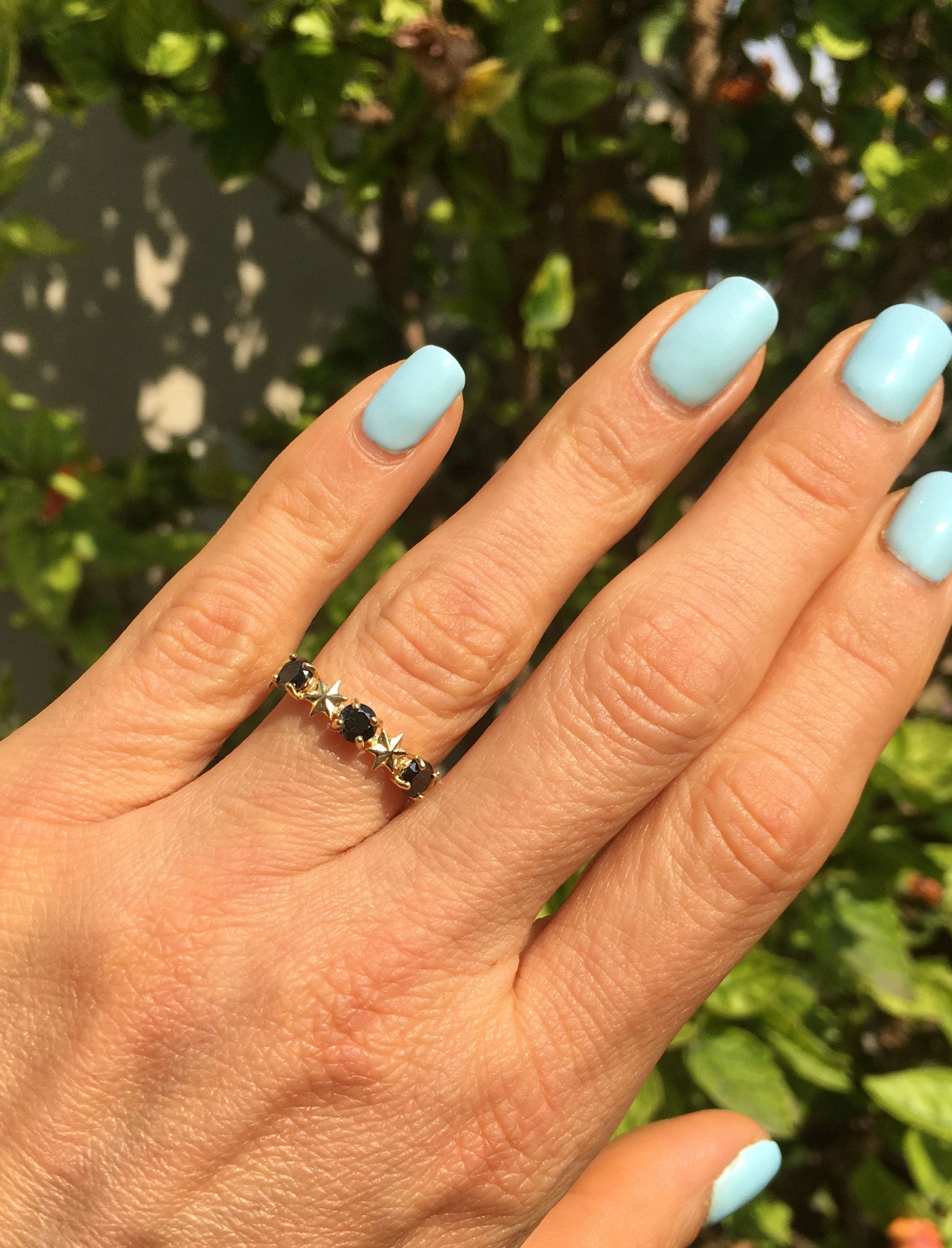 Black Onyx Ring - December Birthstone - Delicate Ring with Three Black Onyx Gemstones and Star Accents - H.L.Jewelry