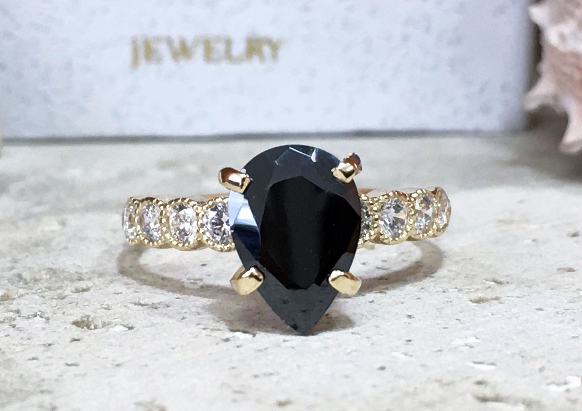 Black Onyx Ring - December Birthstone - Statement Engagement Ring with Pear Shape Black Onyx Middle Gemstone and Clear Quartz Accents - H.L.Jewelry