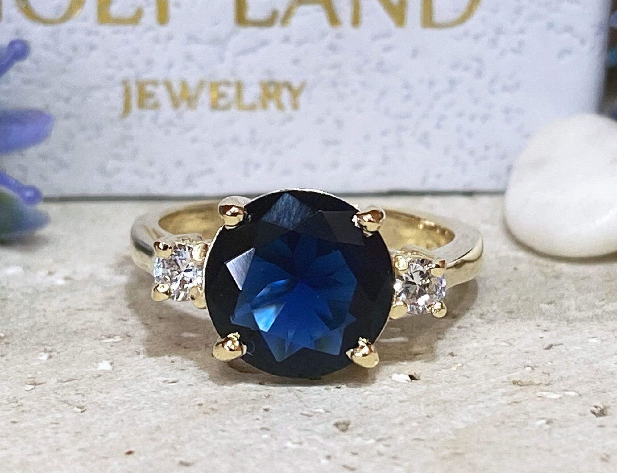 Blue Sapphire Ring - September Birthstone - Statement Engagement Ring with Round Blue Sapphire Gemstone and Clear Quartz Accents - H.L.Jewelry