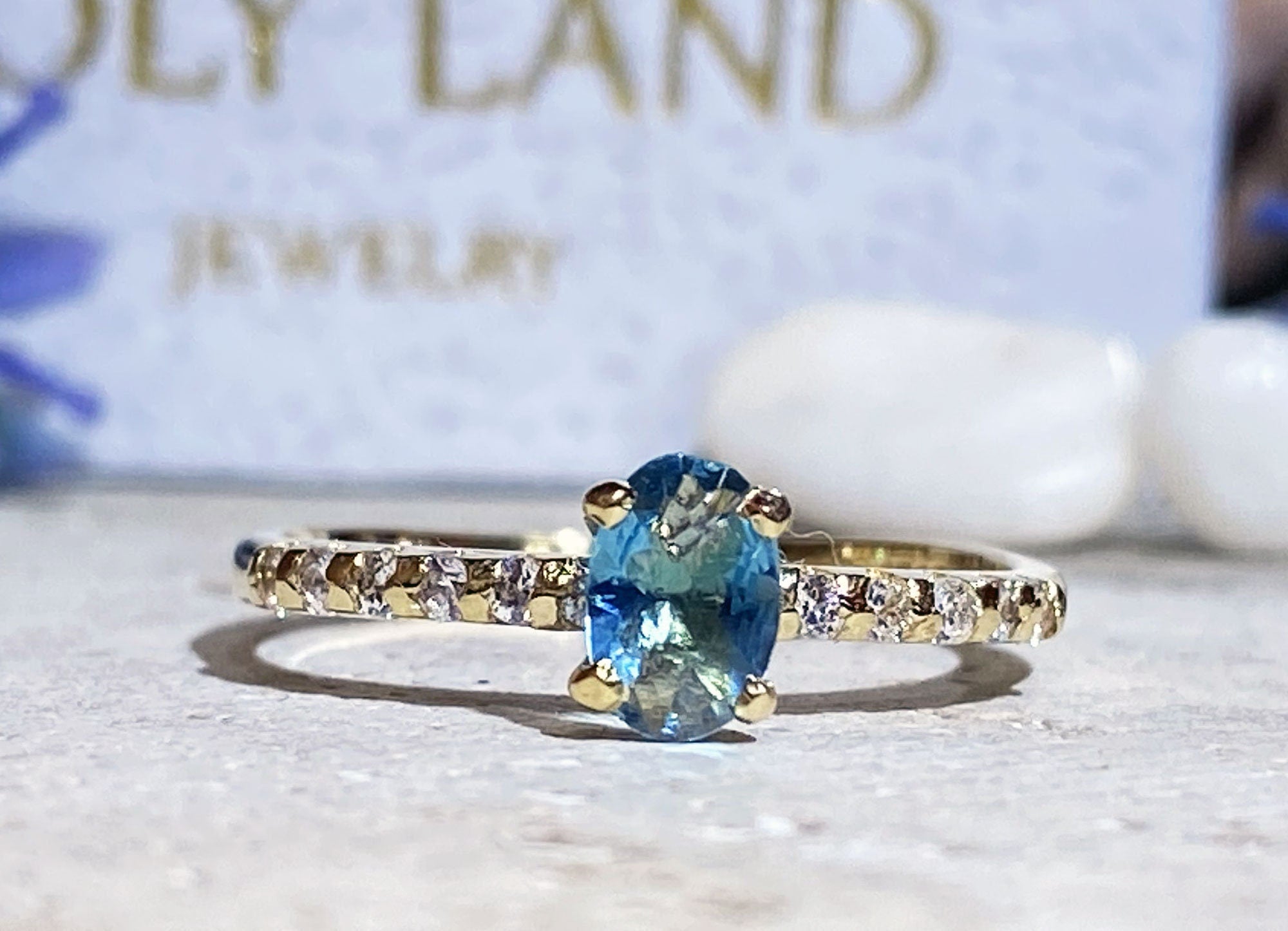 Blue Topaz Ring - December Birthstone - Oval Blue Topaz Ring with Clear Quartz Accents - H.L.Jewelry