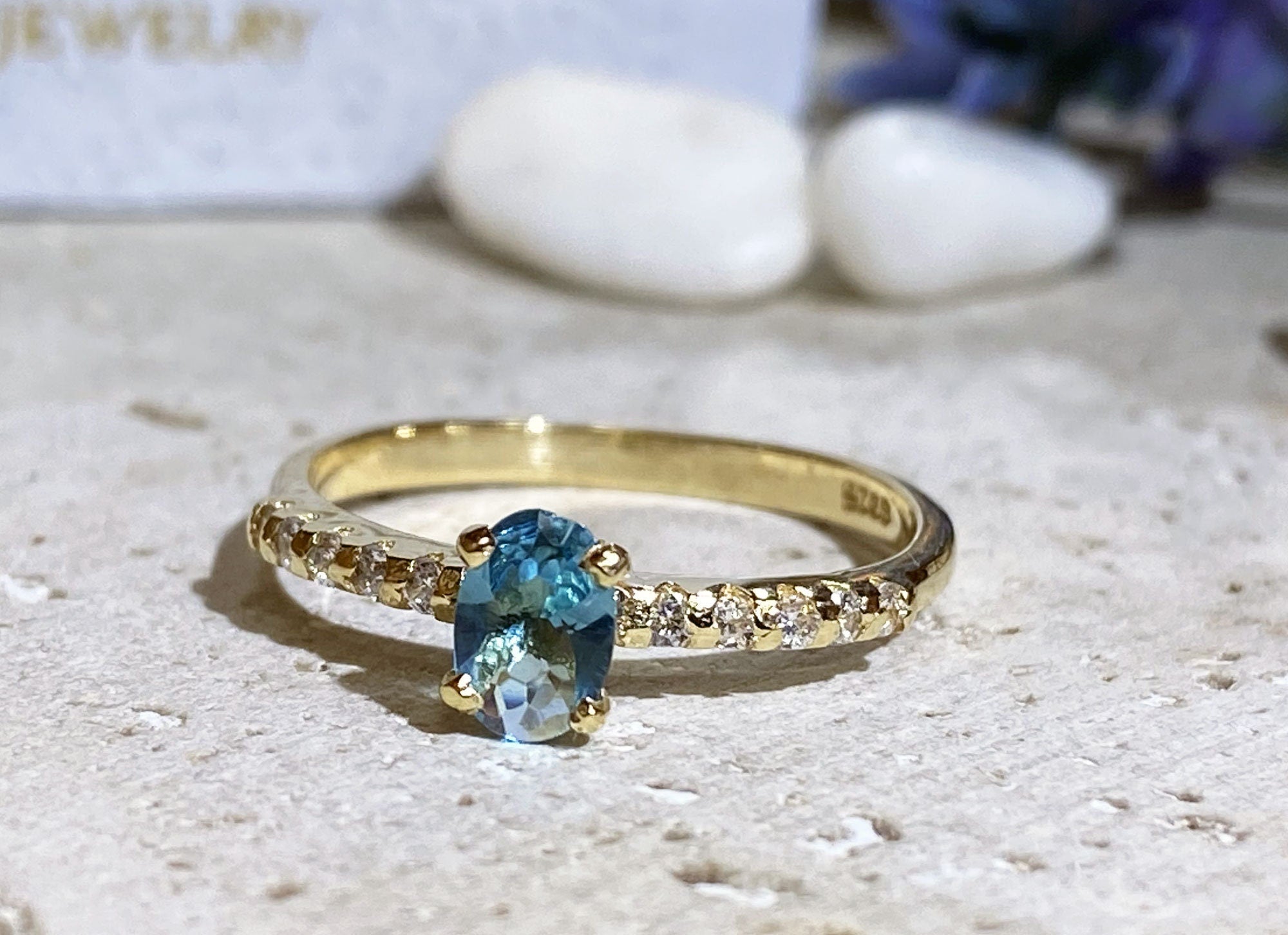 Blue Topaz Ring - December Birthstone - Oval Blue Topaz Ring with Clear Quartz Accents - H.L.Jewelry