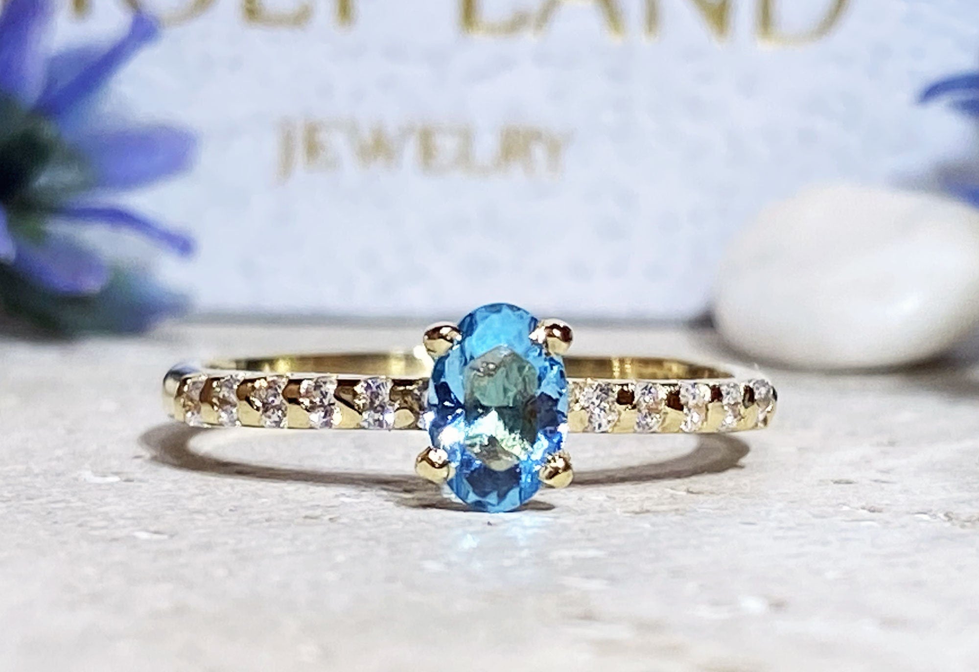 Blue Topaz Ring - December Birthstone - Delicate Oval Blue Topaz Gemstone Ring with Clear Quartz Accents - H.L.Jewelry