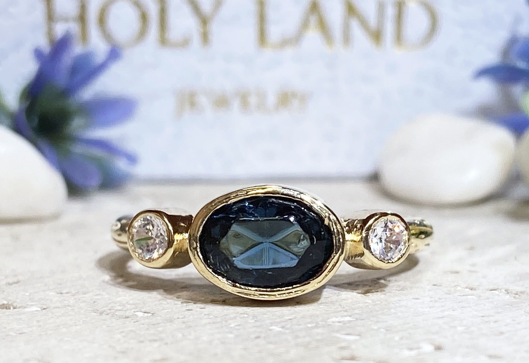 Blue Sapphire Ring - September Birthstone - Bezel Set Ring with Oval Blue Sapphire Gemstone and Clear Quartz Accents - H.L.Jewelry